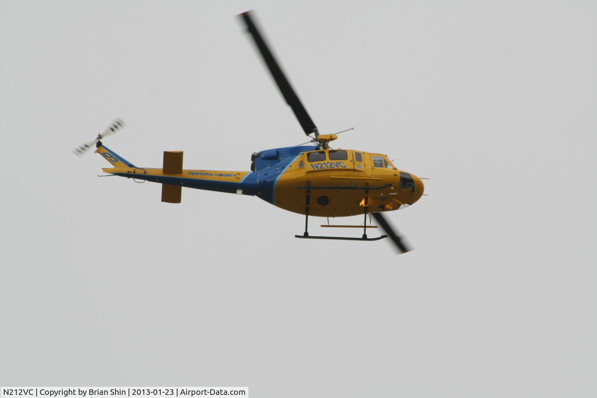 N212VC, 1975 Bell 212 C/N 30693, In search of suspects who fled a stolen vehicle.