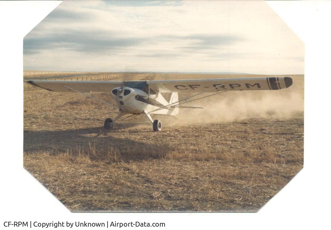 CF-RPM, 1946 Taylorcraft BC12-D C/N 8939, CF-RPM taking off on prairie near Medicine Hat, Alberta.