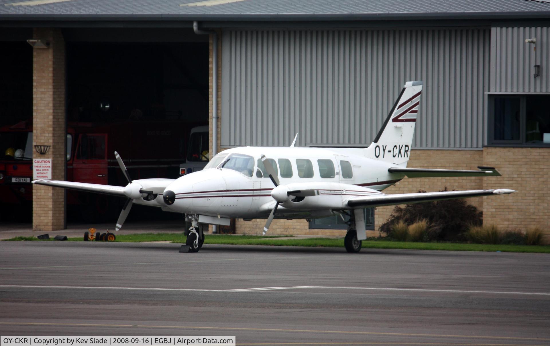 OY-CKR, Piper PA-31-350 Chieftain C/N 31-7652124, Photographed from the cafe area.