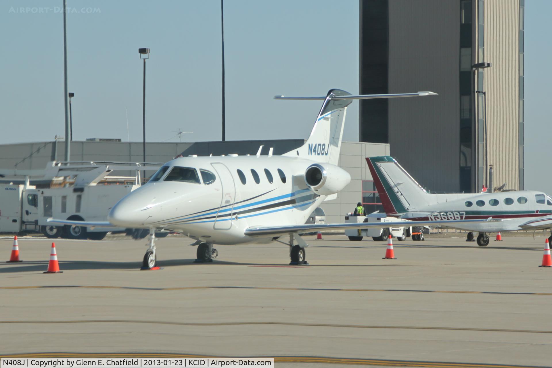 N408J, 2007 Hawker Beechcraft Corp 390 C/N RB-193, Parked in front of the tower.