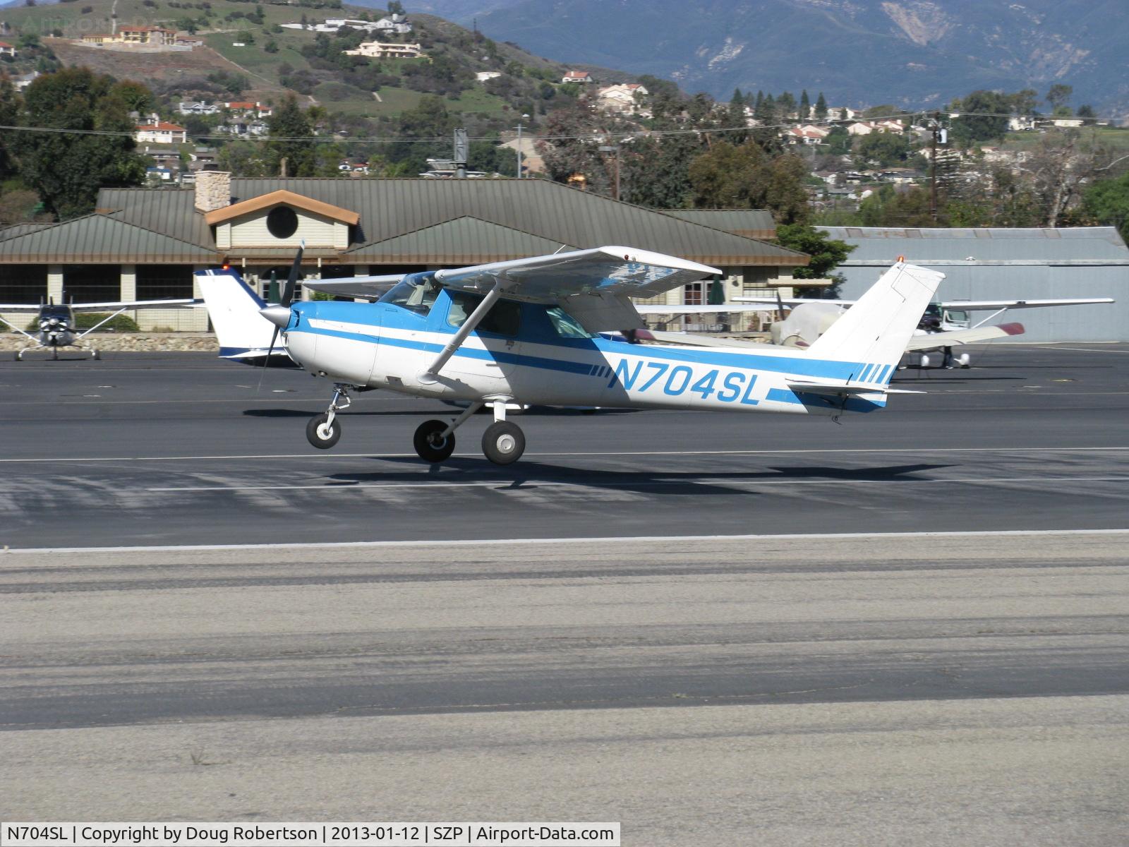 N704SL, 1976 Cessna 150M C/N 15078837, 1976 Cessna 150M,Continental O-200 100 Hp, landing roll Rwy 22 in gusty weather