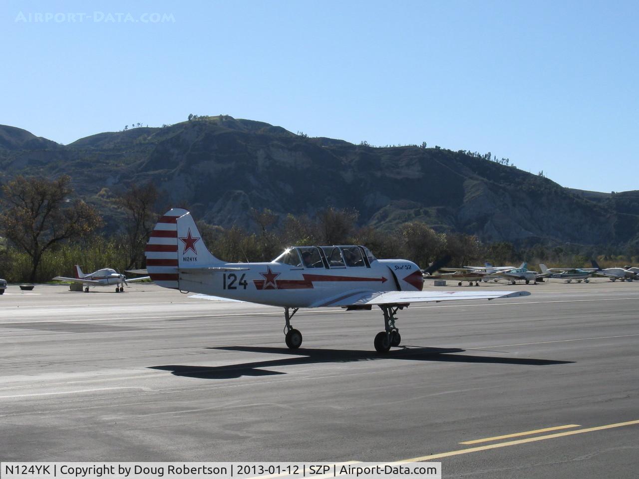 N124YK, 1984 Yakovlev Yak-52 C/N 844804, 1984 Intreprinderea de Avioane Bacau-Romania (Yakovlev) YAK 52, Vedeneev MP-14P 9 cylinder radial 360 Hp, taxi to Rwy 04