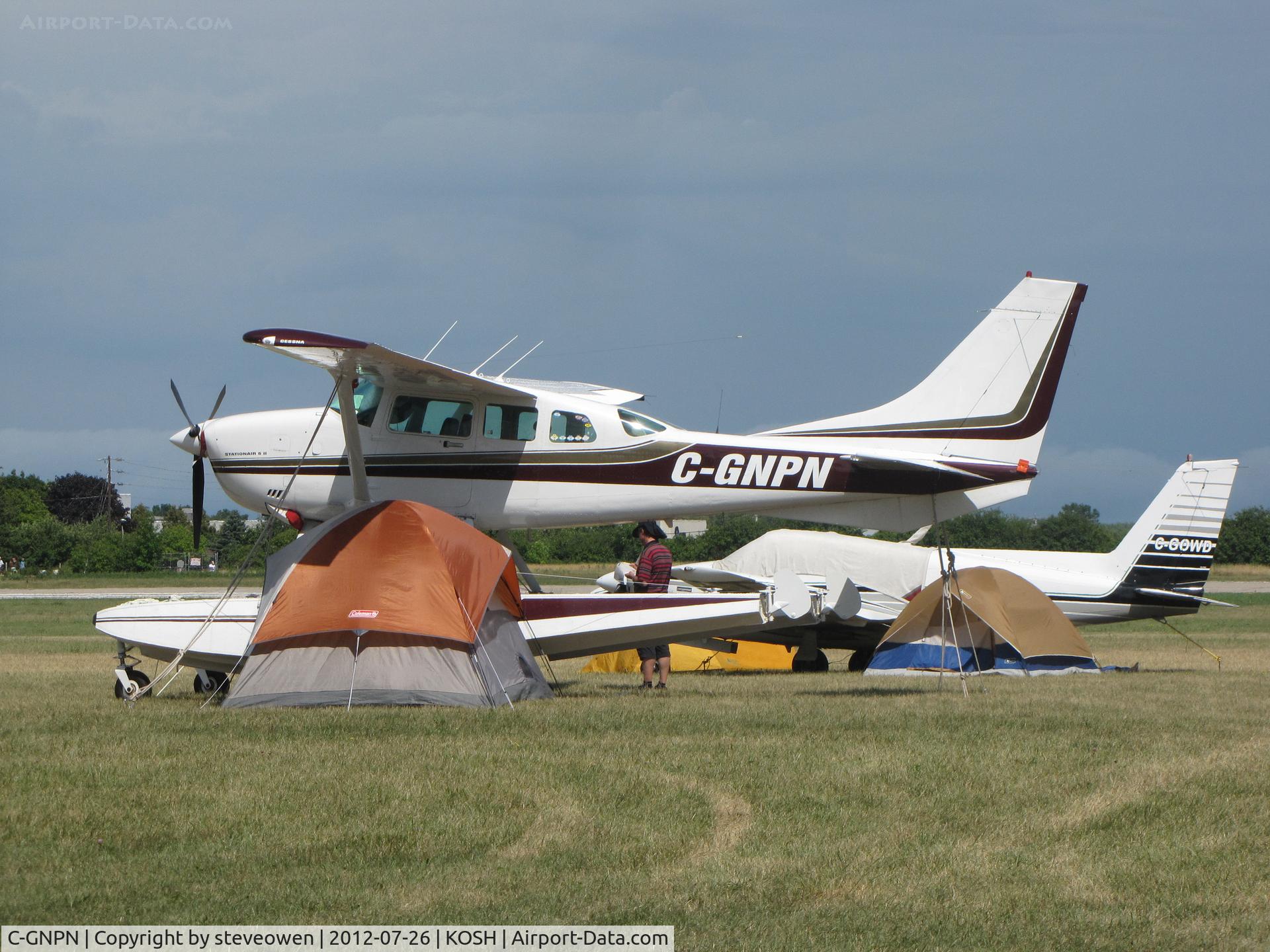 C-GNPN, 1981 Cessna TU206G Turbo Stationair C/N U20606194, High and dry at Oshkosh
