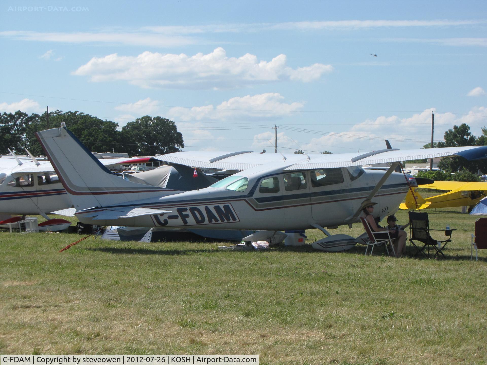 C-FDAM, 1963 Cessna 210-5 (205) C/N 205-0407, in the camp grounds at Oshkosh