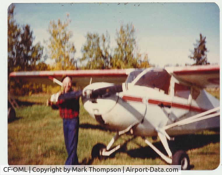 CF-OML, 1946 Commonwealth 185 Skyranger C/N 1869, A fuzzy pic of Walt Pudar with his plane on his own farm airstrip in Sangudo Alberta. I took this picture in 1983.