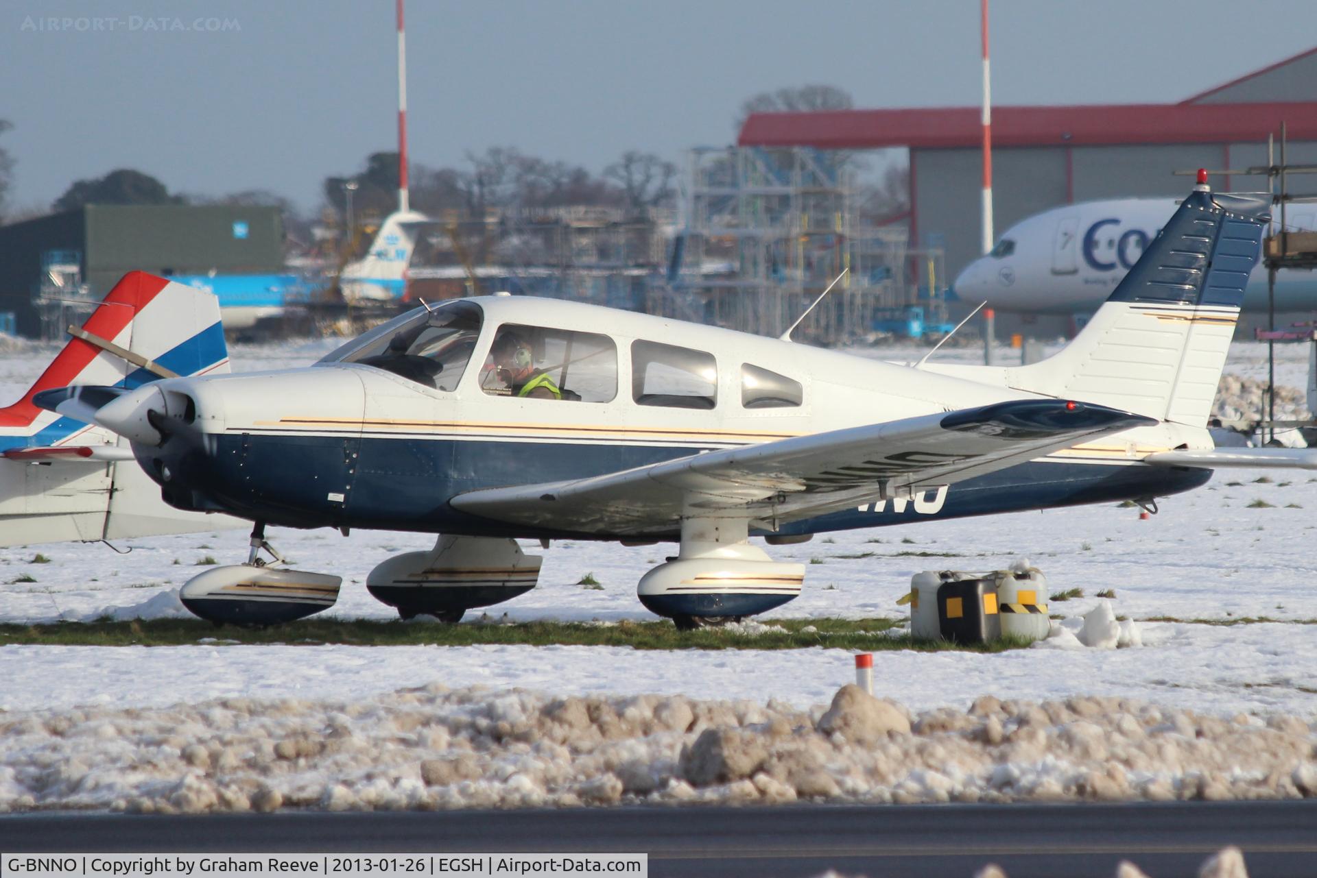 G-BNNO, 1981 Piper PA-28-161 Cherokee Warrior II C/N 28-8116099, Parked in the snow.