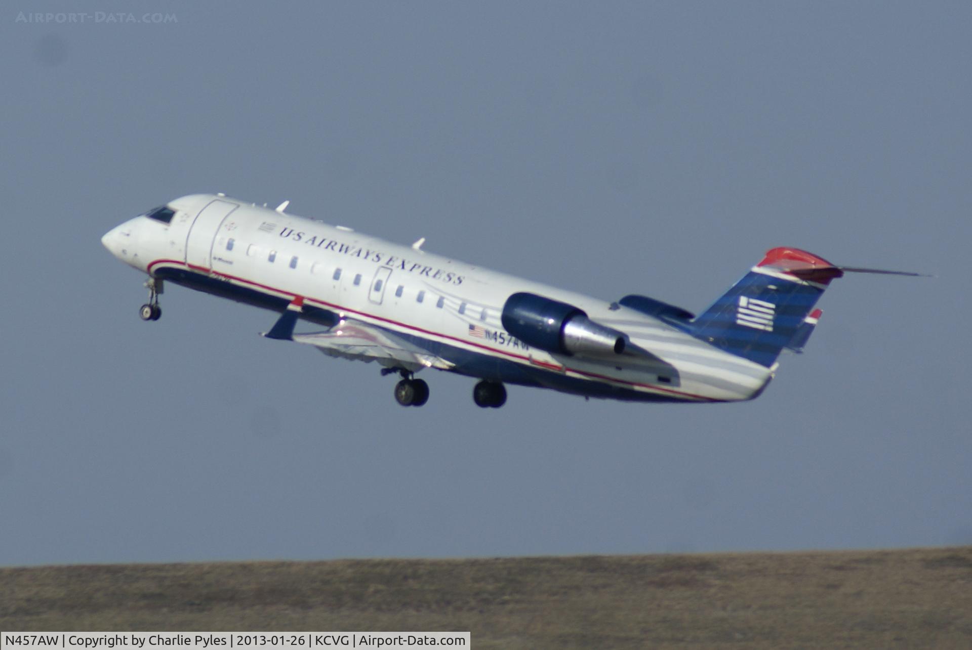 N457AW, 2003 Canadair CRJ-200LR (CL-600-2B19) C/N 7854, Bad place to shoot R/W27 departures but it beats not shootin' at all.