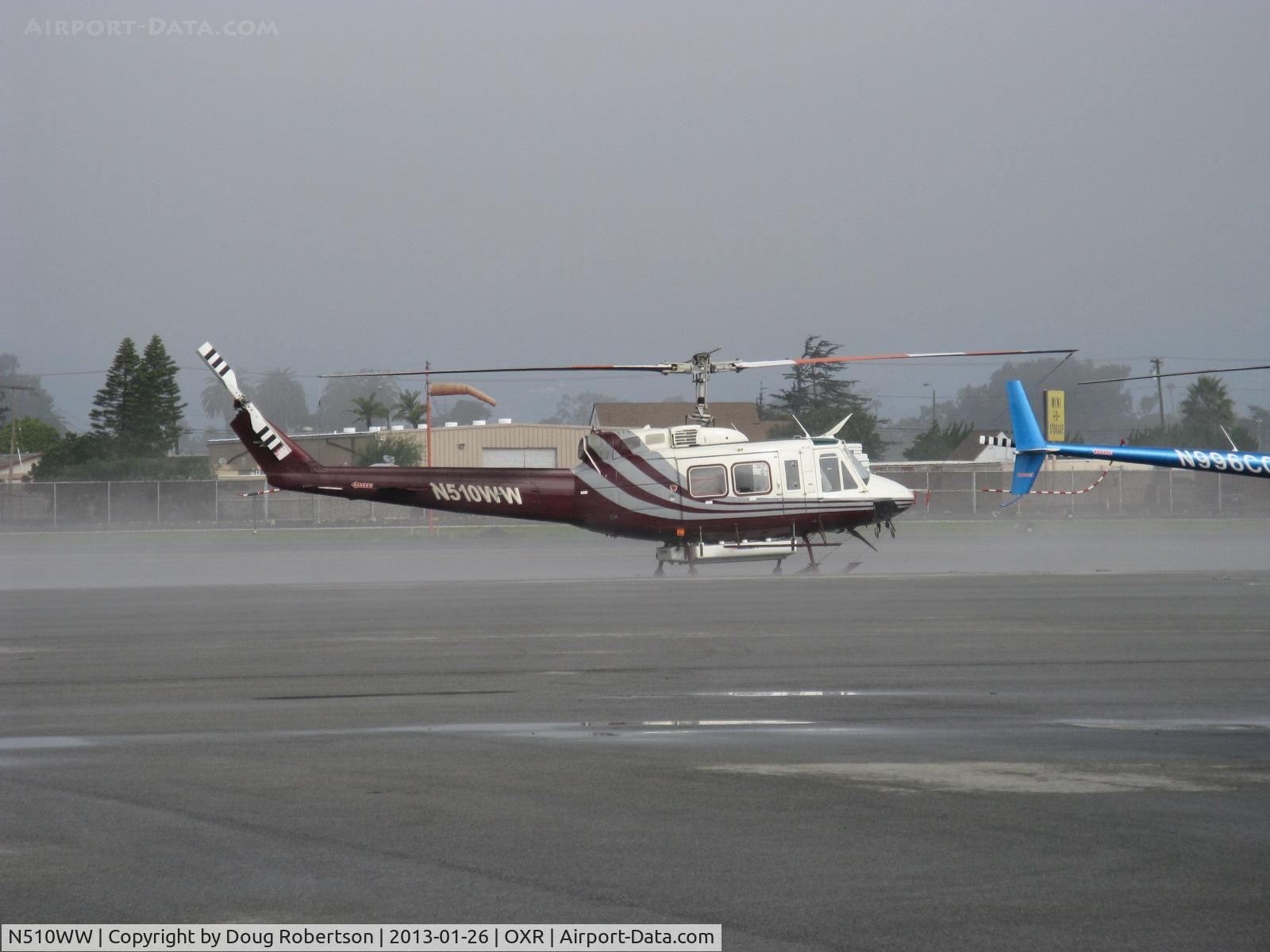N510WW, 2008 Bell 210 C/N 21003, 2008 Bell Helicopter Textron 210, one Honeywell T5317B turbo-shaft engine of 1,500 Shaft Hp. In ground and coastal fog. The 210 is a remanufactured version of a Bell UH-1 Iroquois 'Huey.'