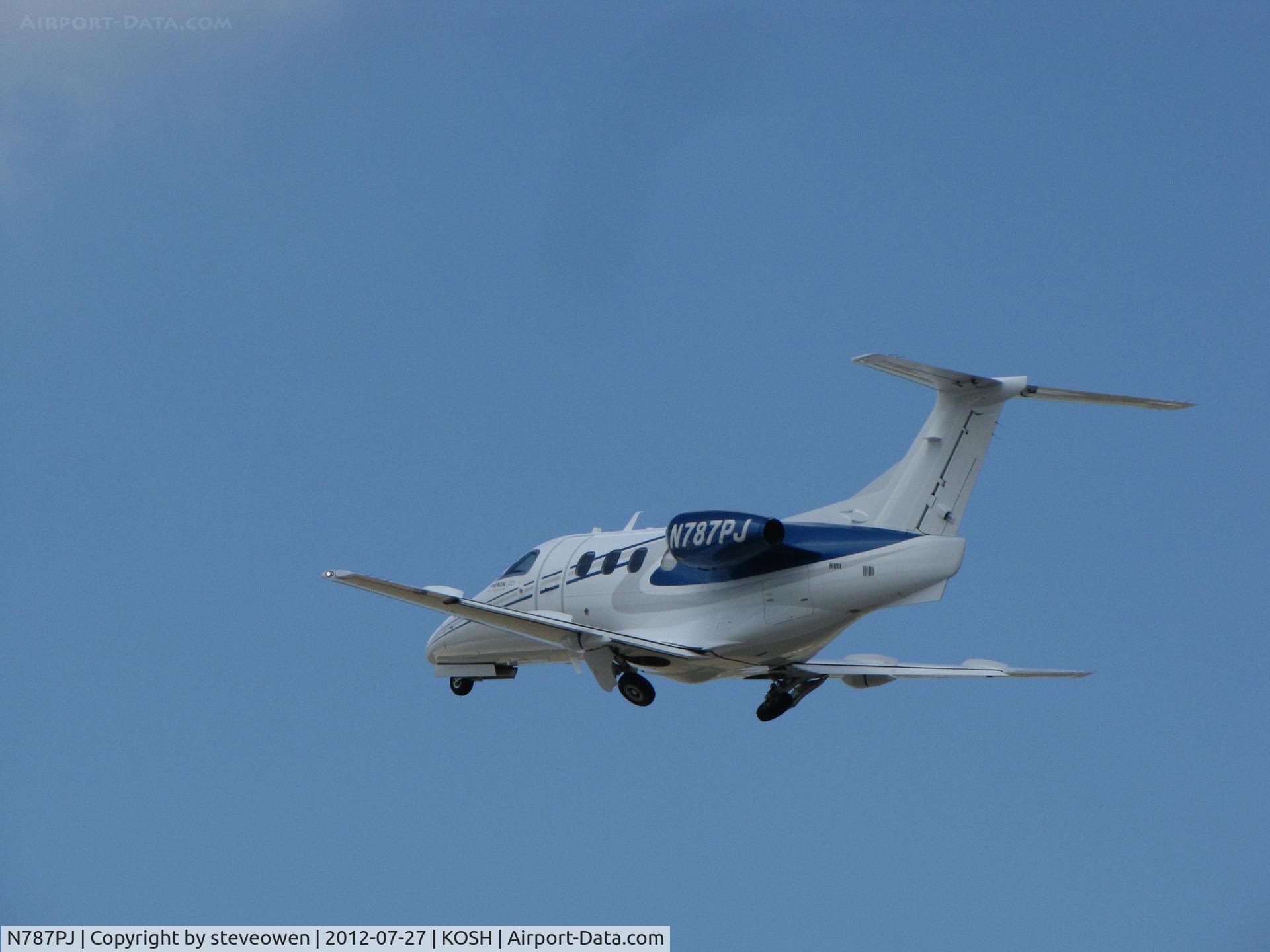 N787PJ, 2011 Embraer EMB-500 Phenom 100 C/N 50000258, departing Oshkosh
