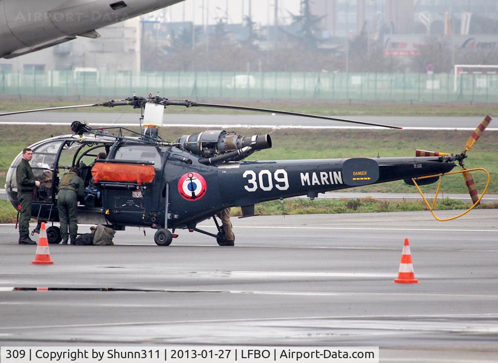 309, Aerospatiale SA-319B Alouette III C/N 2309, Parked at the General Aviation area for a refuelling...