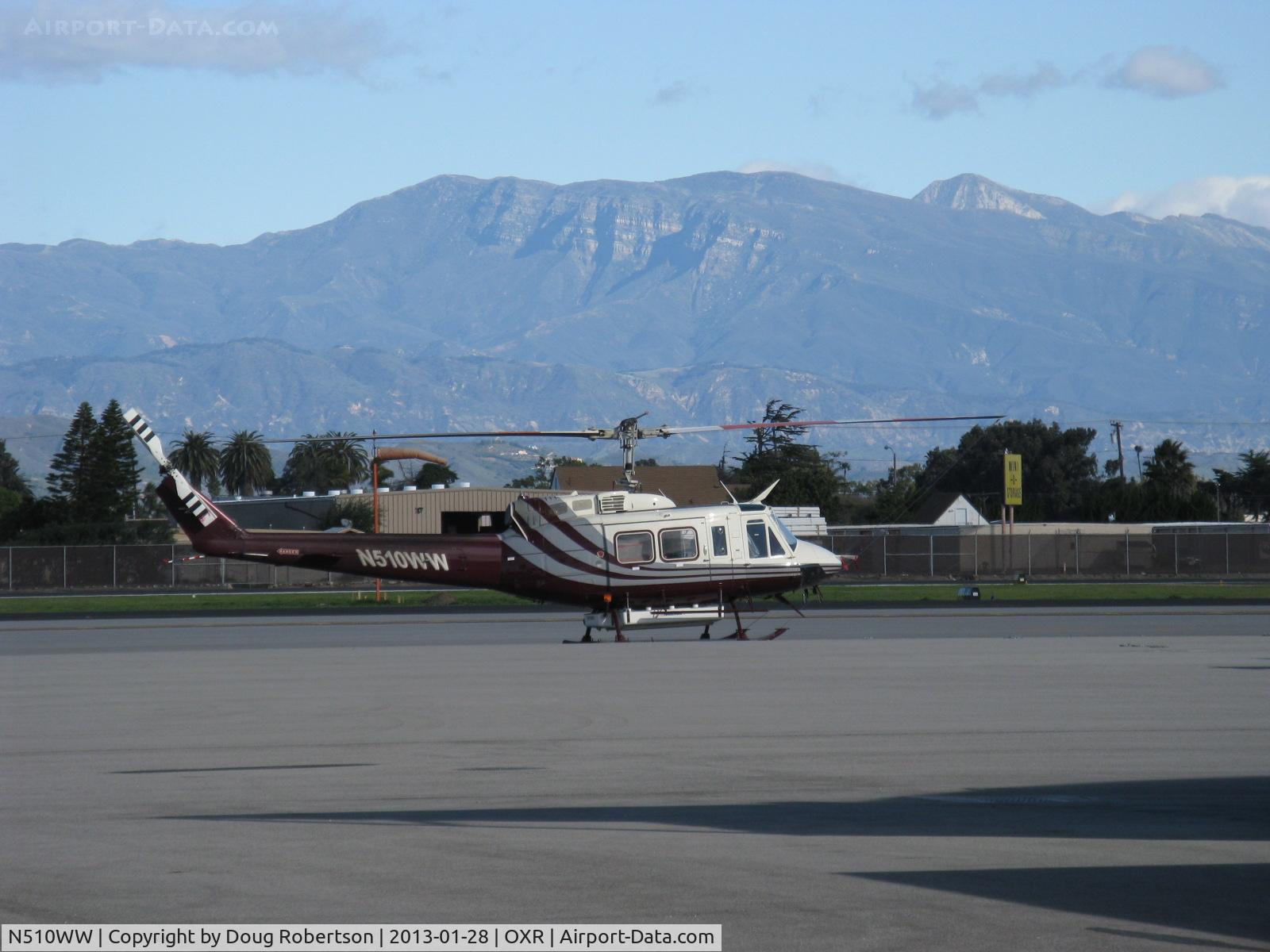 N510WW, 2008 Bell 210 C/N 21003, 2008 Bell Helicopter Textron 210, one Honeywell T5317B turbo-shaft engine of 1,500 Shaft Hp. In better light. The 210 is remanufactured version of Bell UH-1 Iroquois 'Huey.' 6,704' Hines Peak in Topa Topa Mtns. in right background. 6,244' dominant central