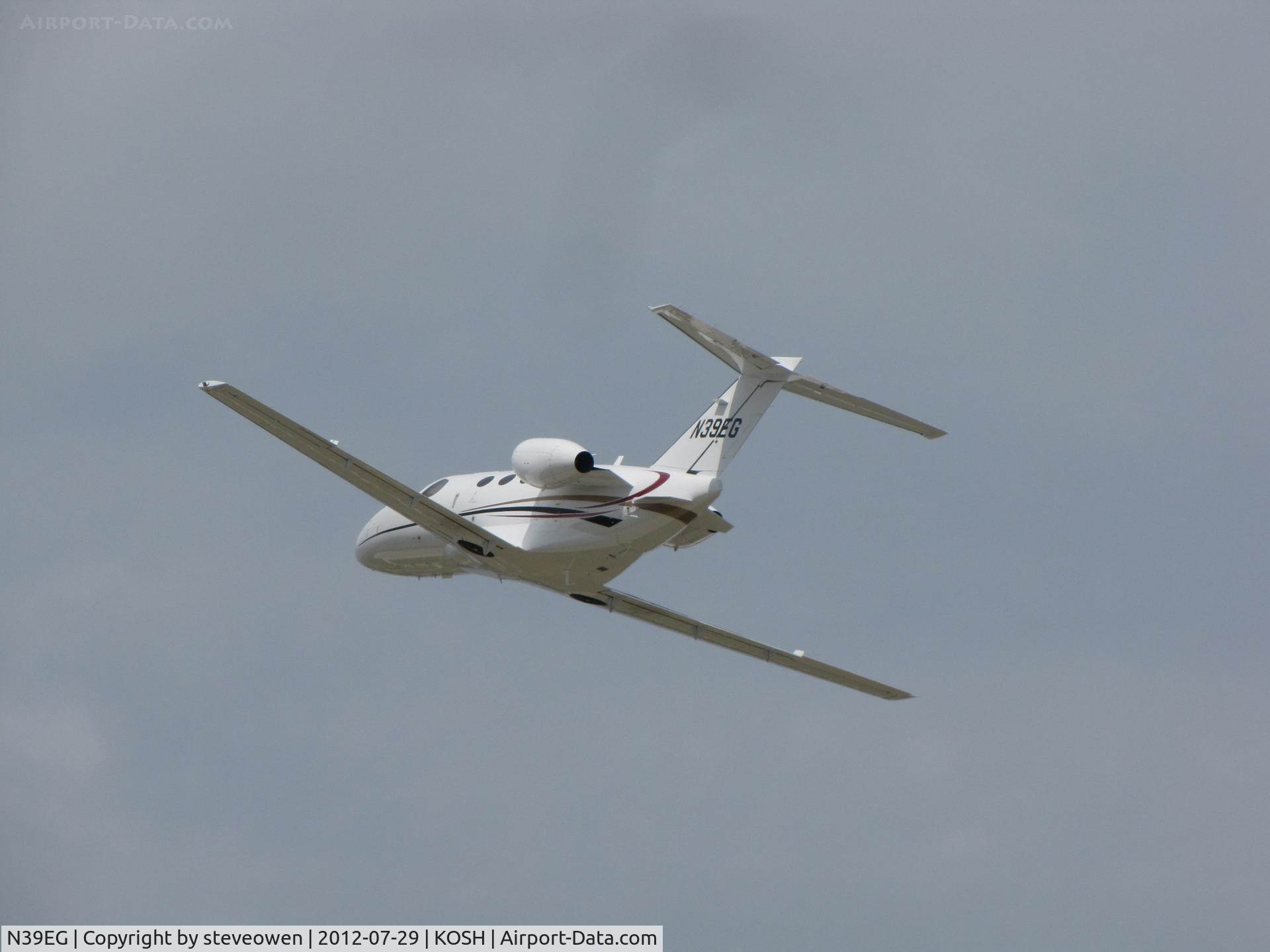 N39EG, 2010 Cessna 510 Citation Mustang Citation Mustang C/N 510-0291, CLIMBING OUT OF OSHKOSH