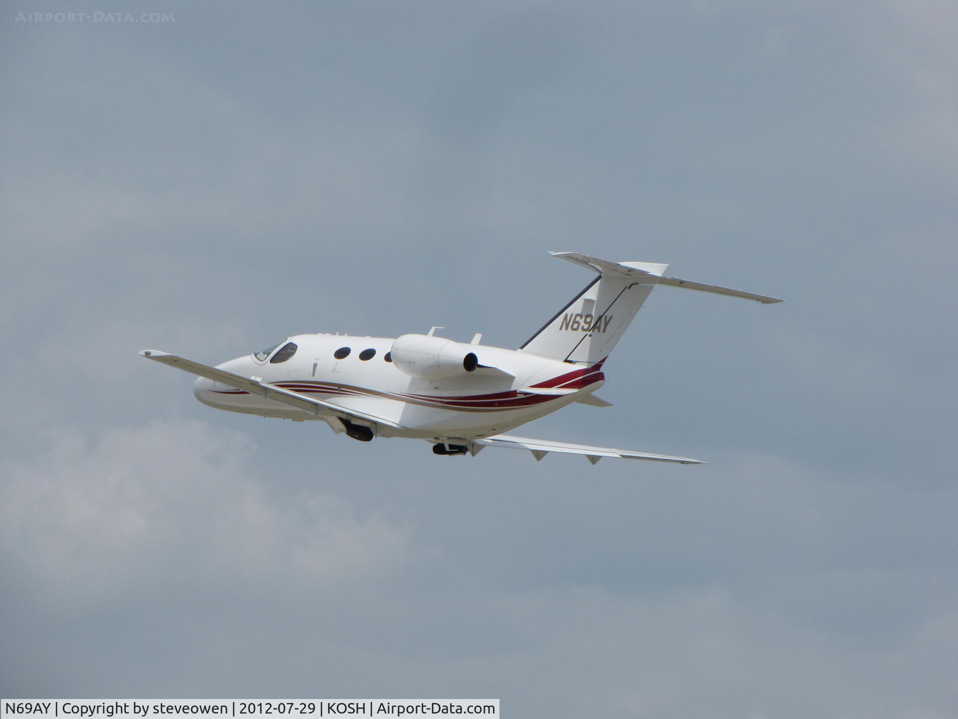 N69AY, 2008 Cessna 510 Citation Mustang Citation Mustang C/N 510-0115, DEPARTING OSHKOSH
