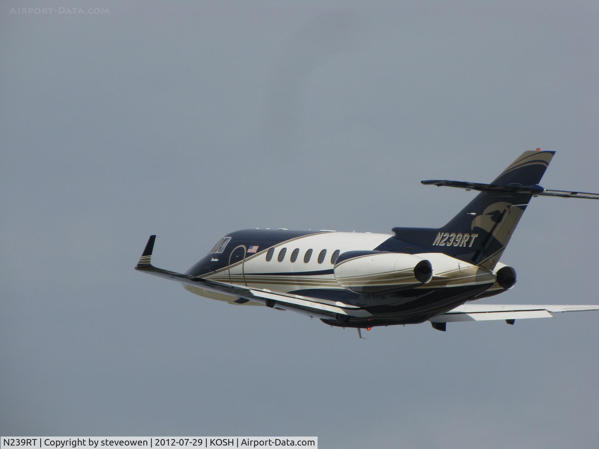 N239RT, Raytheon Aircraft Company 390 C/N RB-139, DEPARTING OSHKOSH