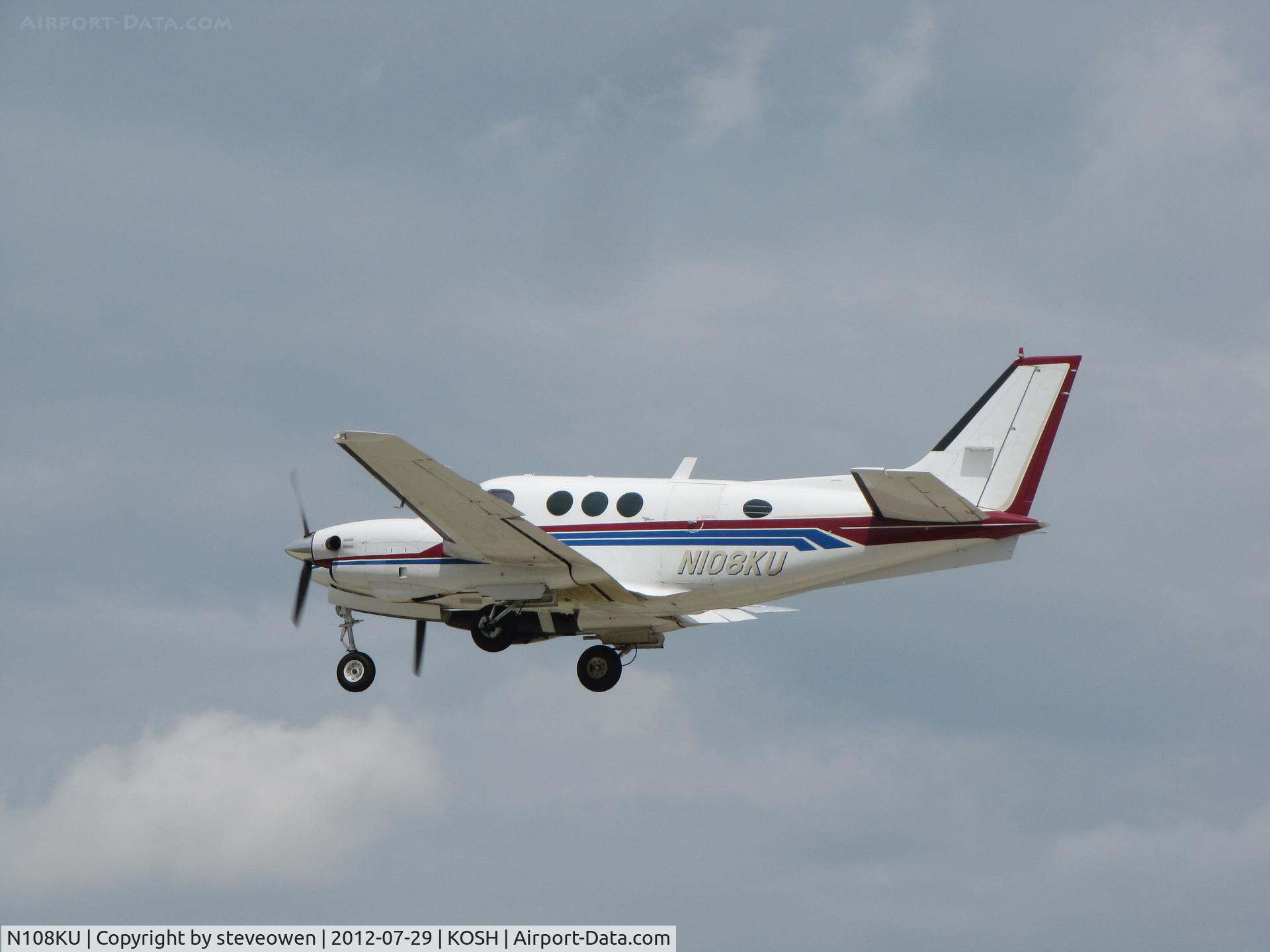 N108KU, 1972 Beech C90 King Air C/N LJ-568, WHEELS UP HEADING OUT OF OSHKOSH