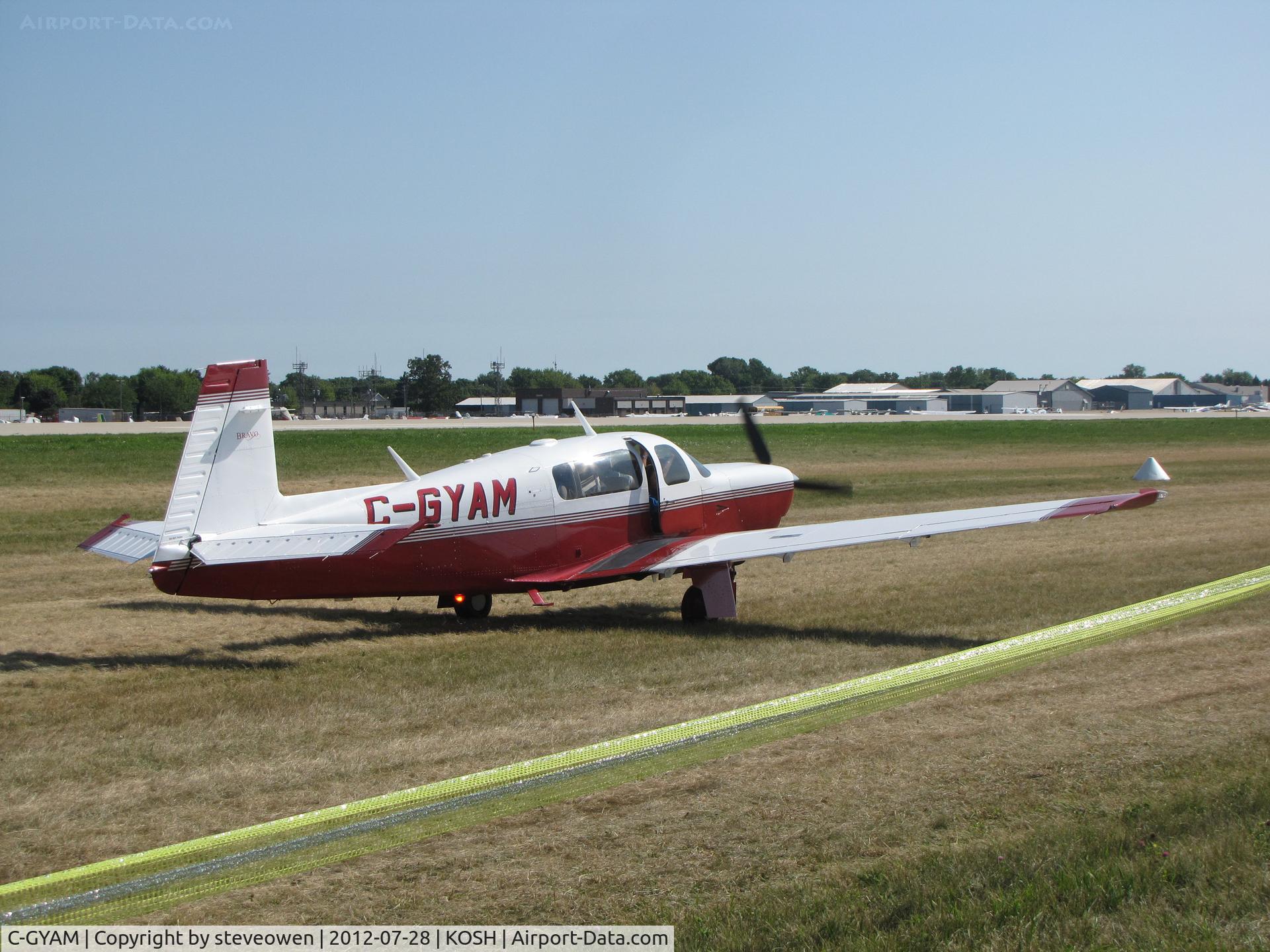 C-GYAM, 2000 Mooney M20M Bravo C/N 27-0304, TAXING OUT AT OSHKOSH