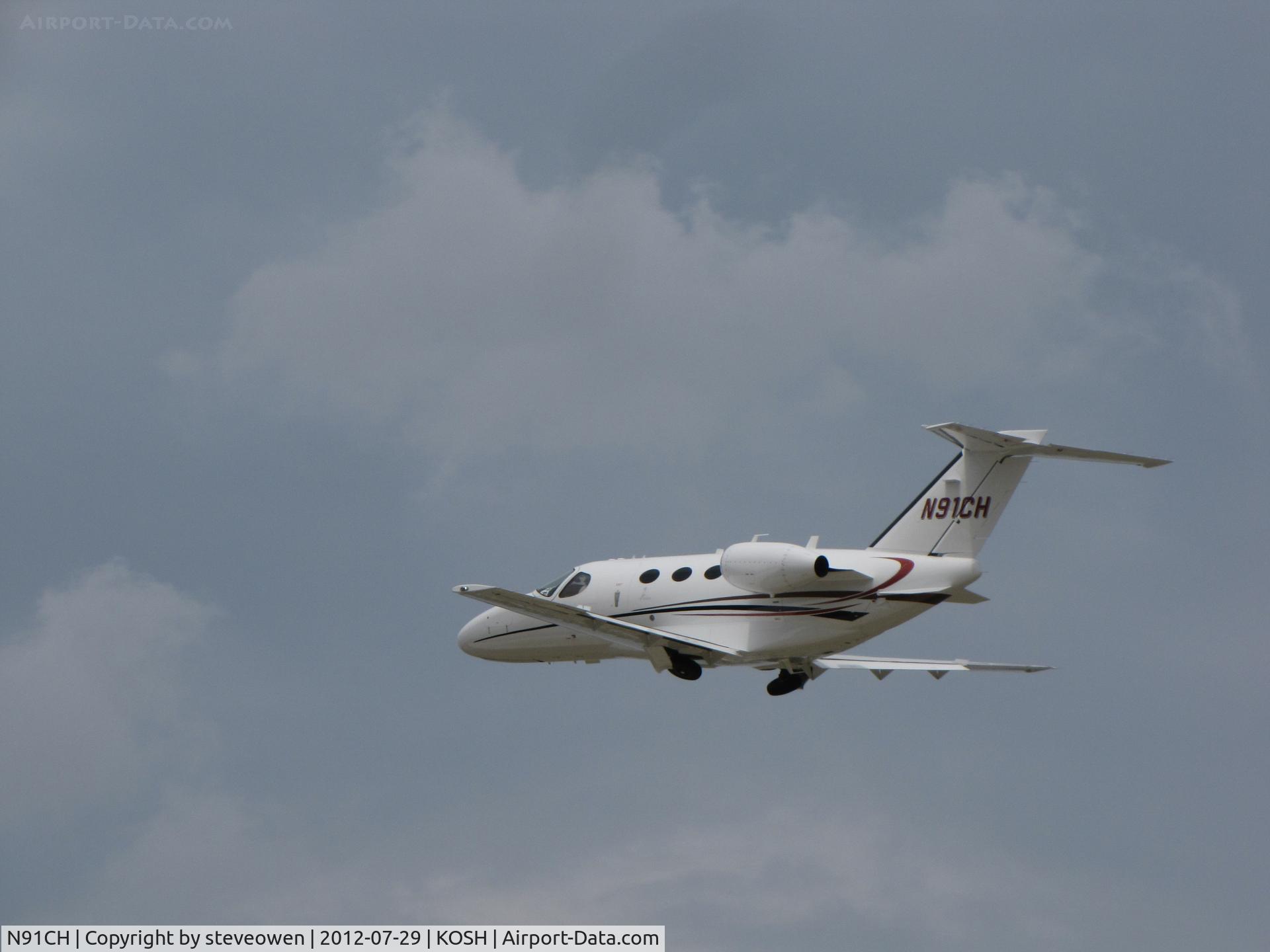 N91CH, 2009 Cessna 510 Citation Mustang Citation Mustang C/N 510-0201, DEPARTING OSHKOSH