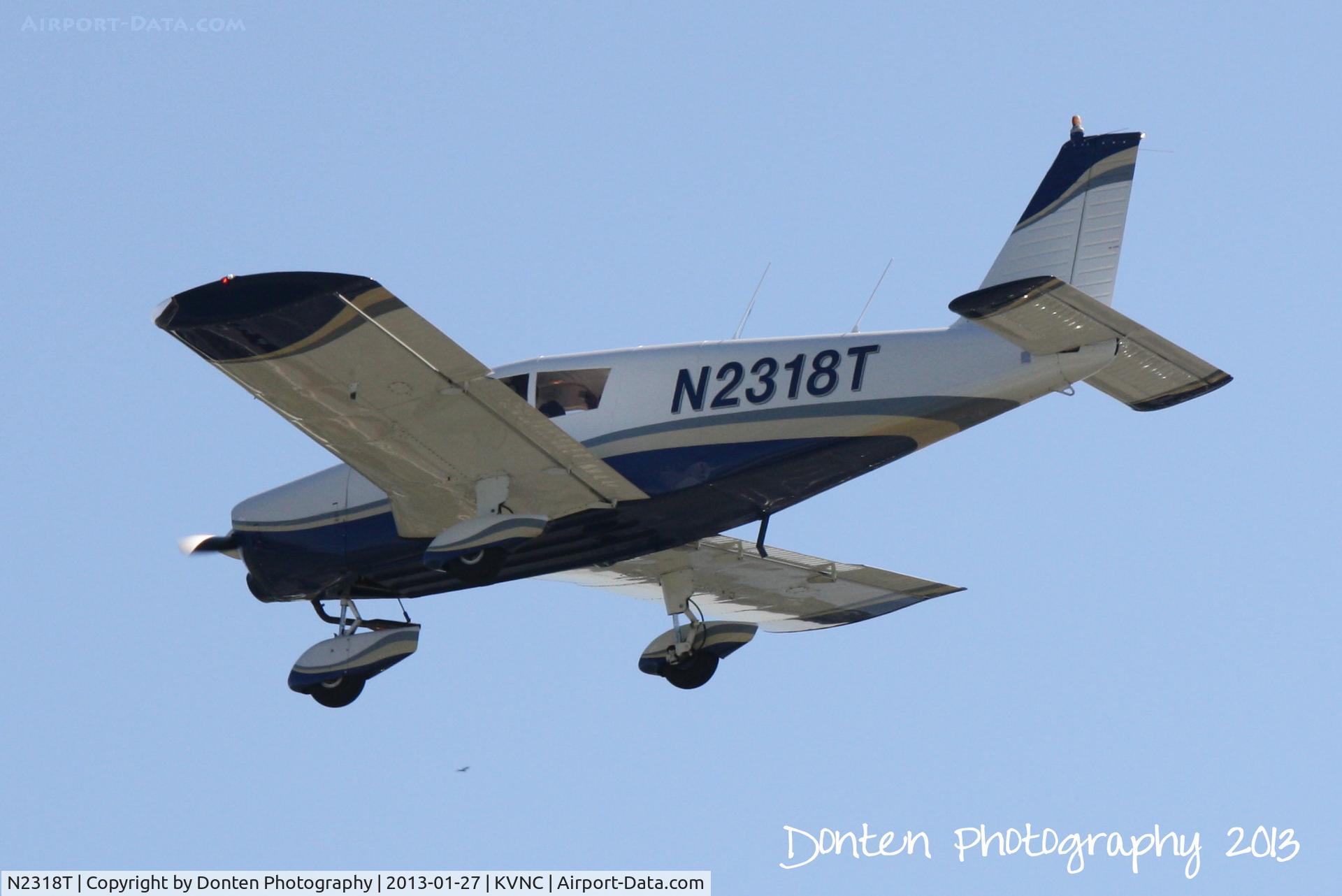 N2318T, 1971 Piper PA-28-140 Cherokee C/N 28-7125567, Piper Cherokee (N2318T) flies over Brohard Beach on approach to Runway 5 at Venice Municipal Airport
