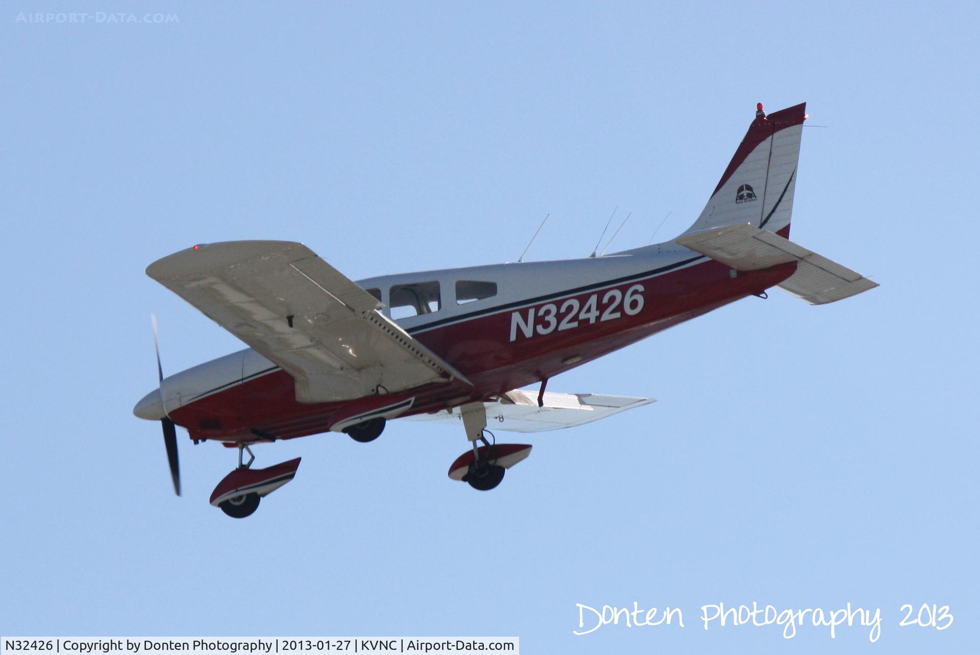 N32426, 1974 Piper PA-28-180 C/N 28-7505059, Piper Cherokee (N32426) flies over Brohard Beach on approach to Runway 5 at Venice Municipal Airport