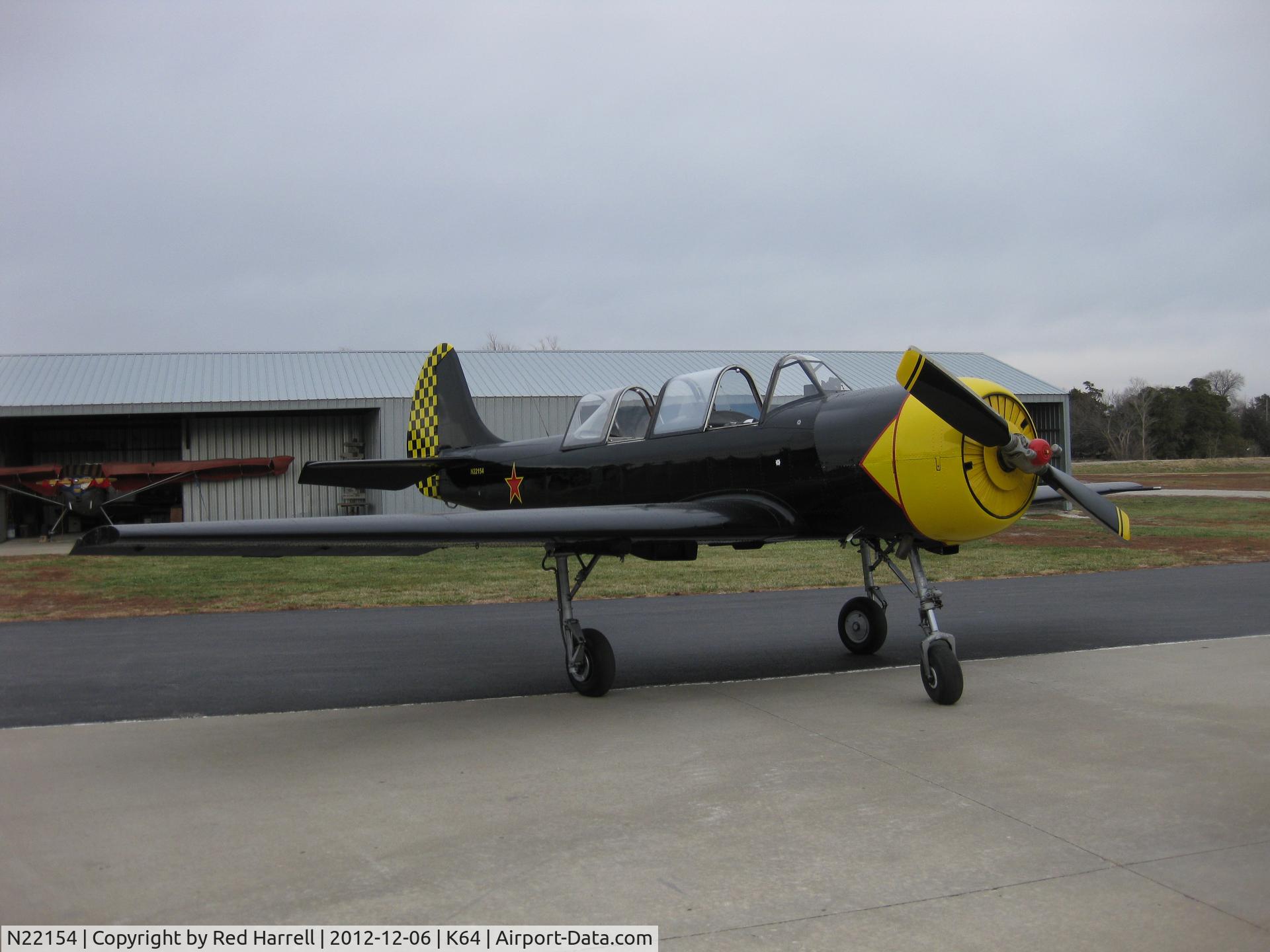 N22154, 1989 Yakovlev Yak-52 C/N 899414, Yak-52 making a refueling stop.
