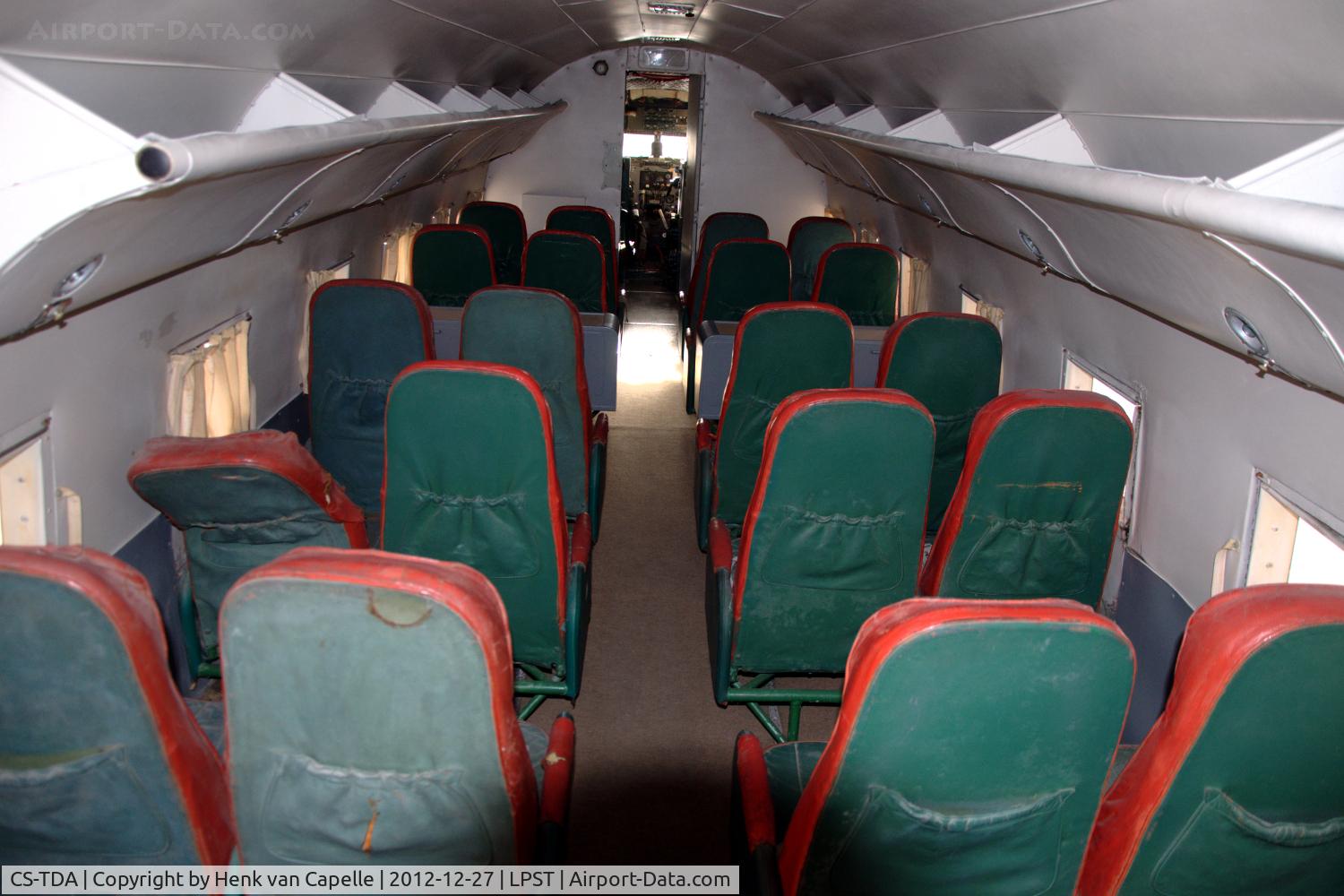 CS-TDA, 1943 Douglas C-47A-80-DL C/N 19503, The passenger cabin of the Douglas C-47A Skytrain preserved in the Museu do Ar at Sintra Air Base in Portugal. Pity there is a broken seat.