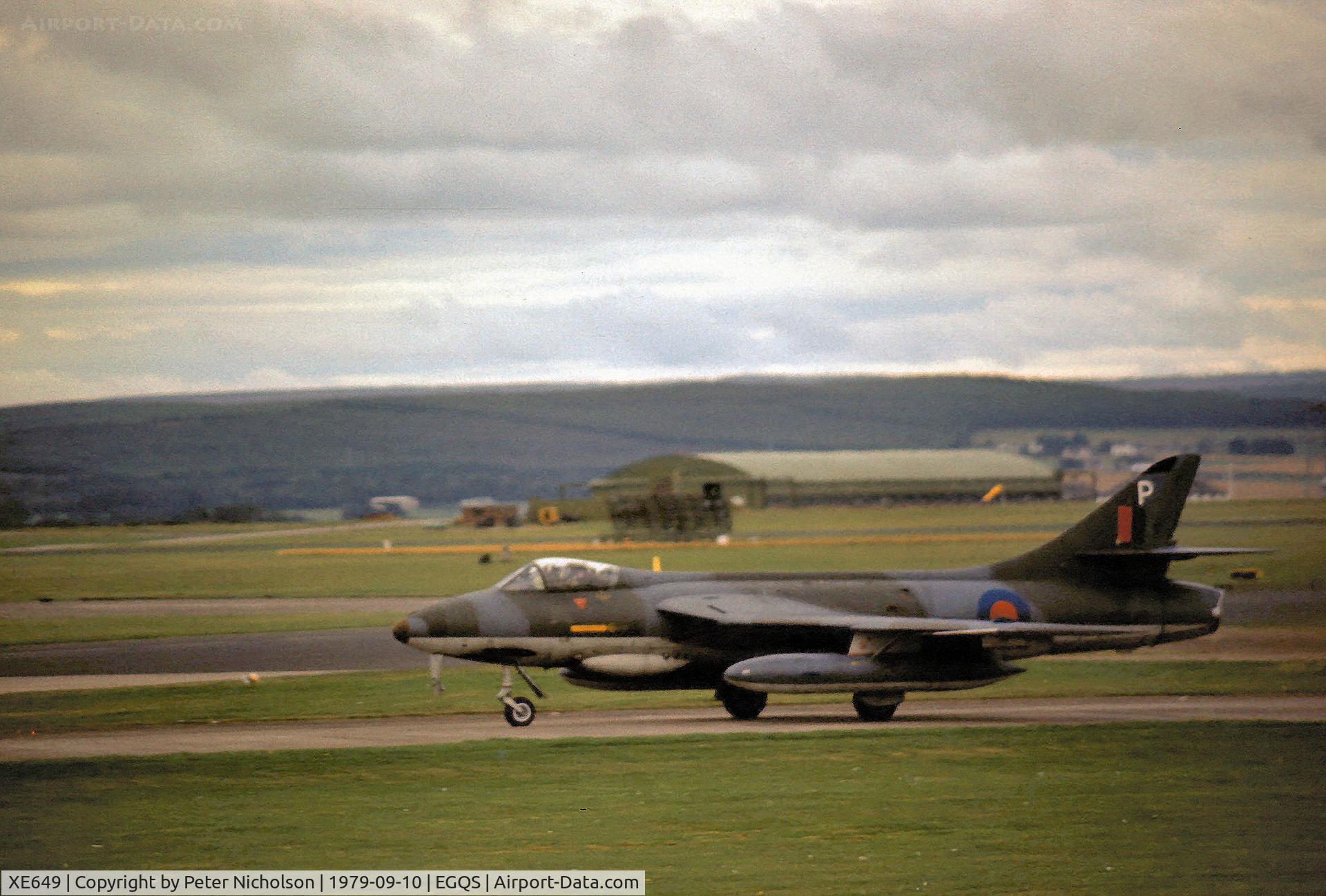 XE649, Hawker Hunter FGA.9 C/N 41H/679993, Hunter FGA.9 of 2 Tactical Weapons Unit taxying to Runway 23 at RAF Lossiemouth in the Summer of 1979.