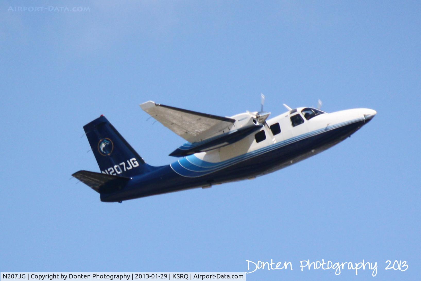 N207JG, 1972 Aero Commander 500 S C/N 3128, Marlin Flight 500 (N207JG) departs Runway 14 at Sarasota-Bradenton International Airport enroute to West Palm Beach International Airport