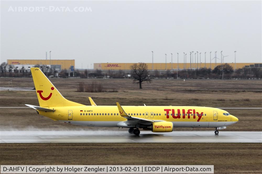 D-AHFV, 2000 Boeing 737-8K5 C/N 30415, Fullthrottle on pretty wet rwy 26R with destination Hurghada/Egypt....