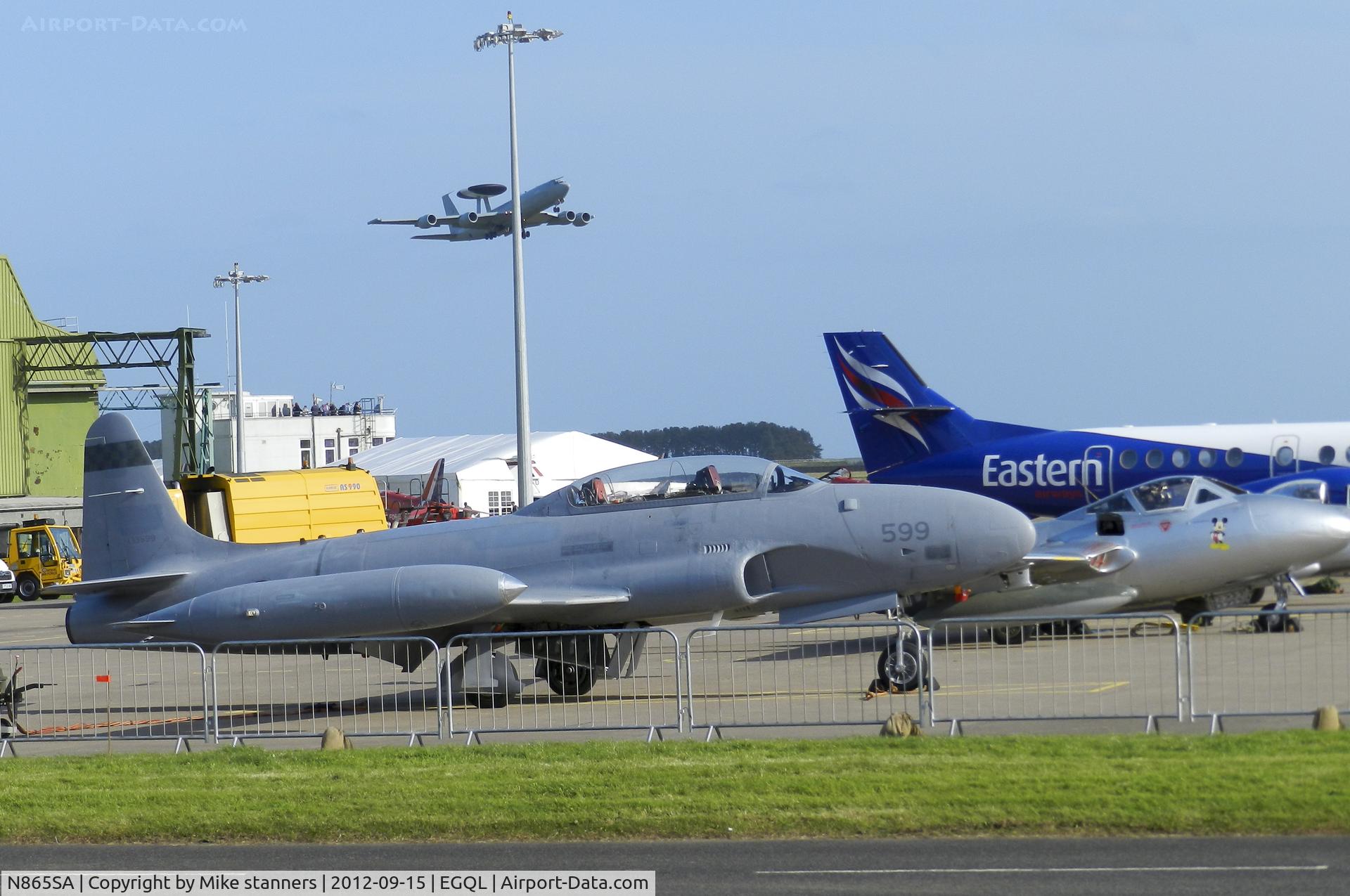 N865SA, 1957 Canadair CT-133 Silver Star 3 C/N T33-599 (133599), Norwegian Airforce Historic flight Silver star 3 on the flightline at Leuchars airshow 2012 with 8sqn Sentry AEW.1 ZH102 Seen in the back ground taking off for its display