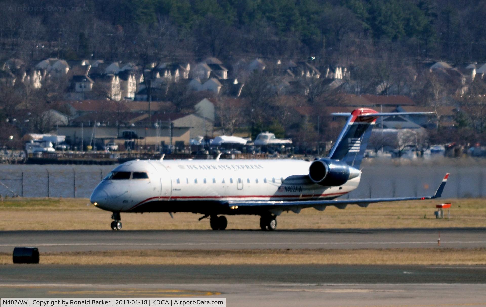 N402AW, 1998 Bombardier CRJ-200LR (CL-600-2B19) C/N 7281, Takeoff National