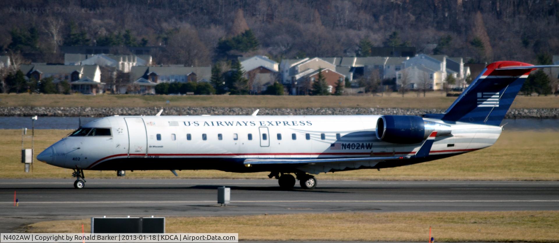 N402AW, 1998 Bombardier CRJ-200LR (CL-600-2B19) C/N 7281, Takeoff DCA