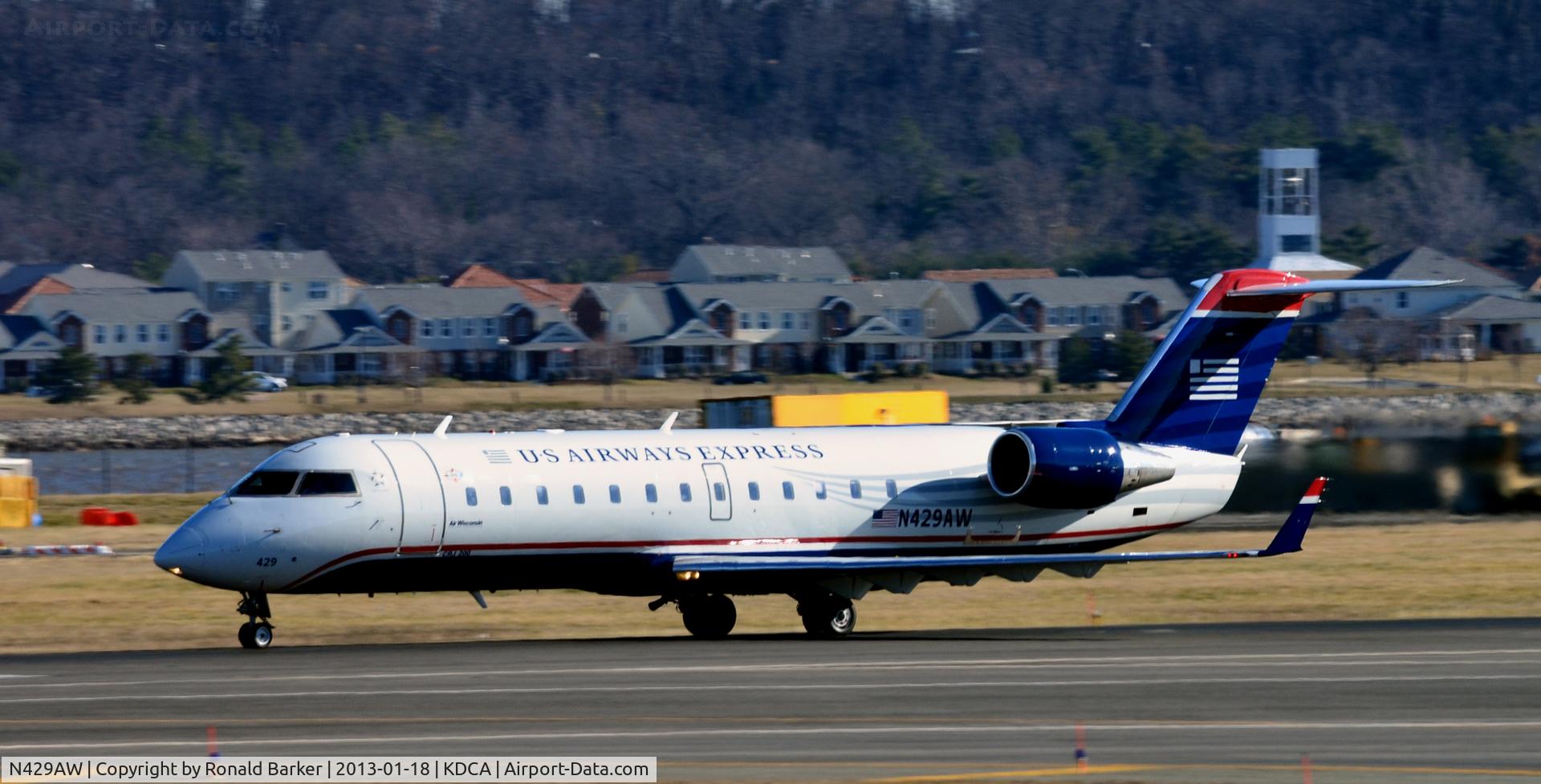 N429AW, 2002 Bombardier CRJ-200LR (CL-600-2B19) C/N 7711, Takeoff DCA