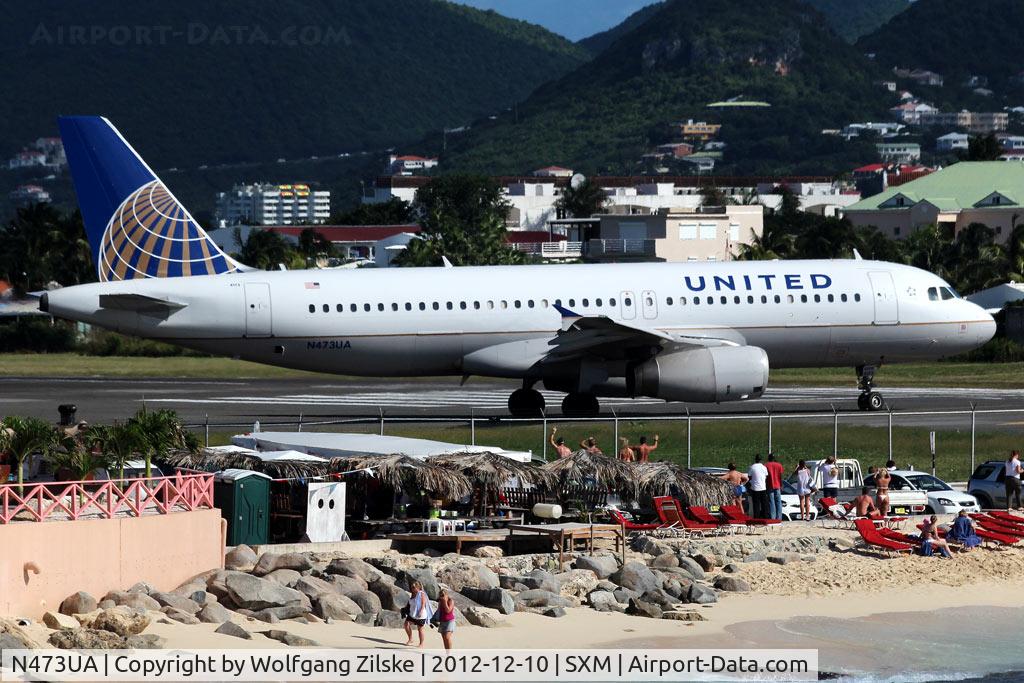 N473UA, 2001 Airbus A320-232 C/N 1469, From the Oceanview Pool of the Sonesta Hotel