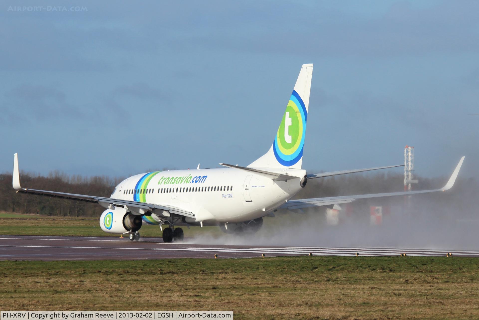 PH-XRV, 2005 Boeing 737-7K2 C/N 34170, Kicking up spray on take off.