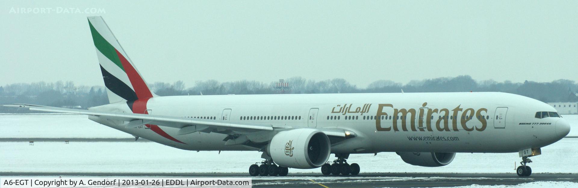 A6-EGT, 2012 Boeing 777-31H/ER C/N 35600, Emirates, is taxiing on taxiway M at Düsseldorf Int´l (EDDL) for departure