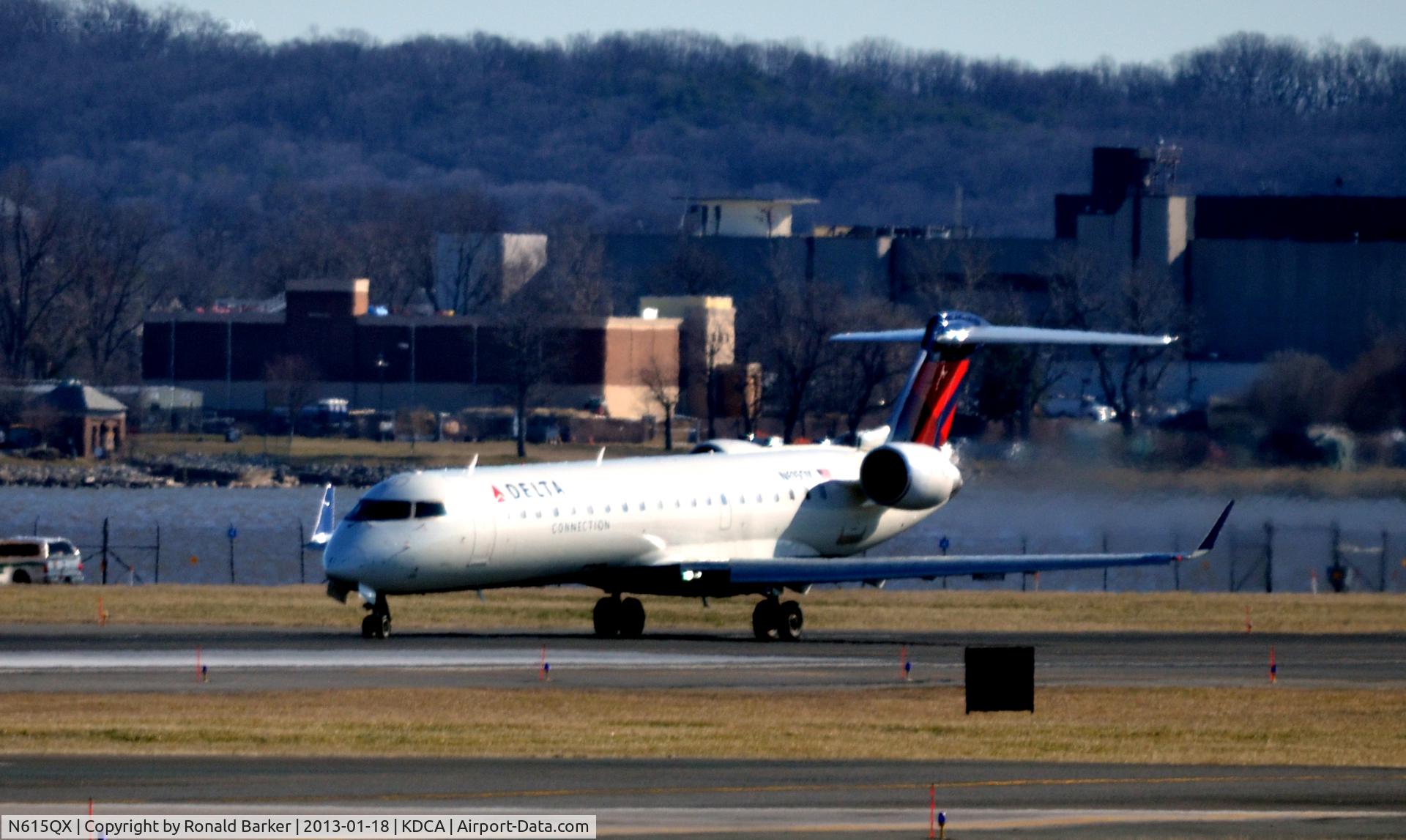 N615QX, 2002 Bombardier CRJ-701 (CL-600-2C10) Regional Jet C/N 10065, Takeoff DCA