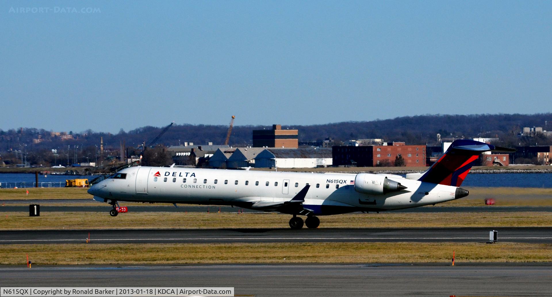N615QX, 2002 Bombardier CRJ-701 (CL-600-2C10) Regional Jet C/N 10065, Takeoff DCA  -  Liftoff