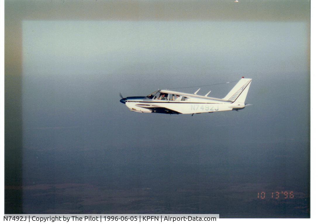 N7492J, 1968 Piper PA-28R-180 Cherokee Arrow C/N 28R-30852, Gear up and haulin ass.. I did 178 knots in the airplane with a little help from a tailwind, Sweetest and cleanest plane I ever owned. If you ever want to sell her back, look me up.