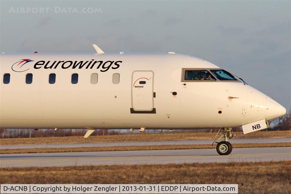 D-ACNB, 2009 Bombardier CRJ-900ER (CL-600-2D24) C/N 15230, Two men at work.....