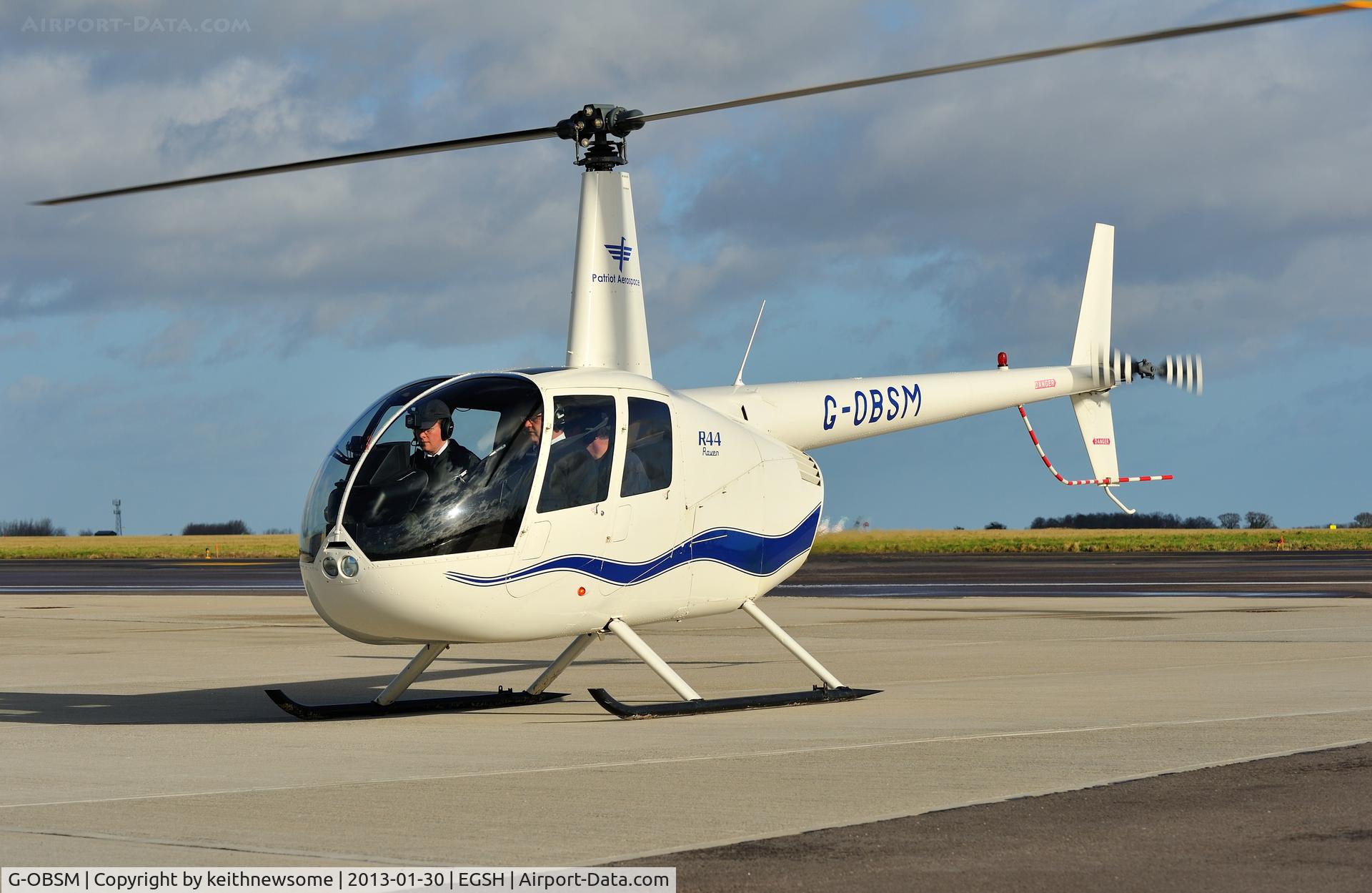 G-OBSM, 2001 Robinson R44 Raven C/N 1030, Resting in the sun.