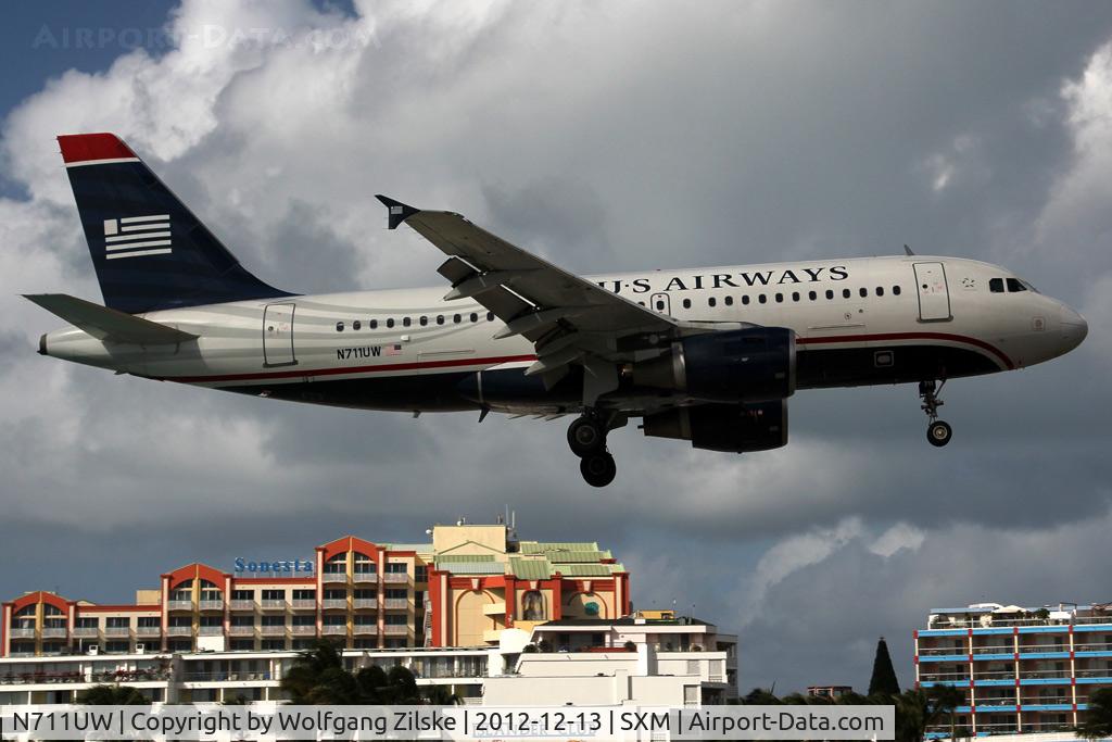N711UW, 1999 Airbus A319-112 C/N 1033, Over famous Maho Beach