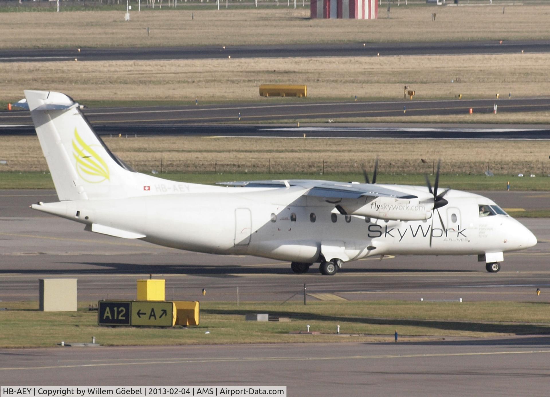 HB-AEY, 1997 Dornier 328-130 C/N 3100, Arrival on Schiphol Airport and taxi to his gate.