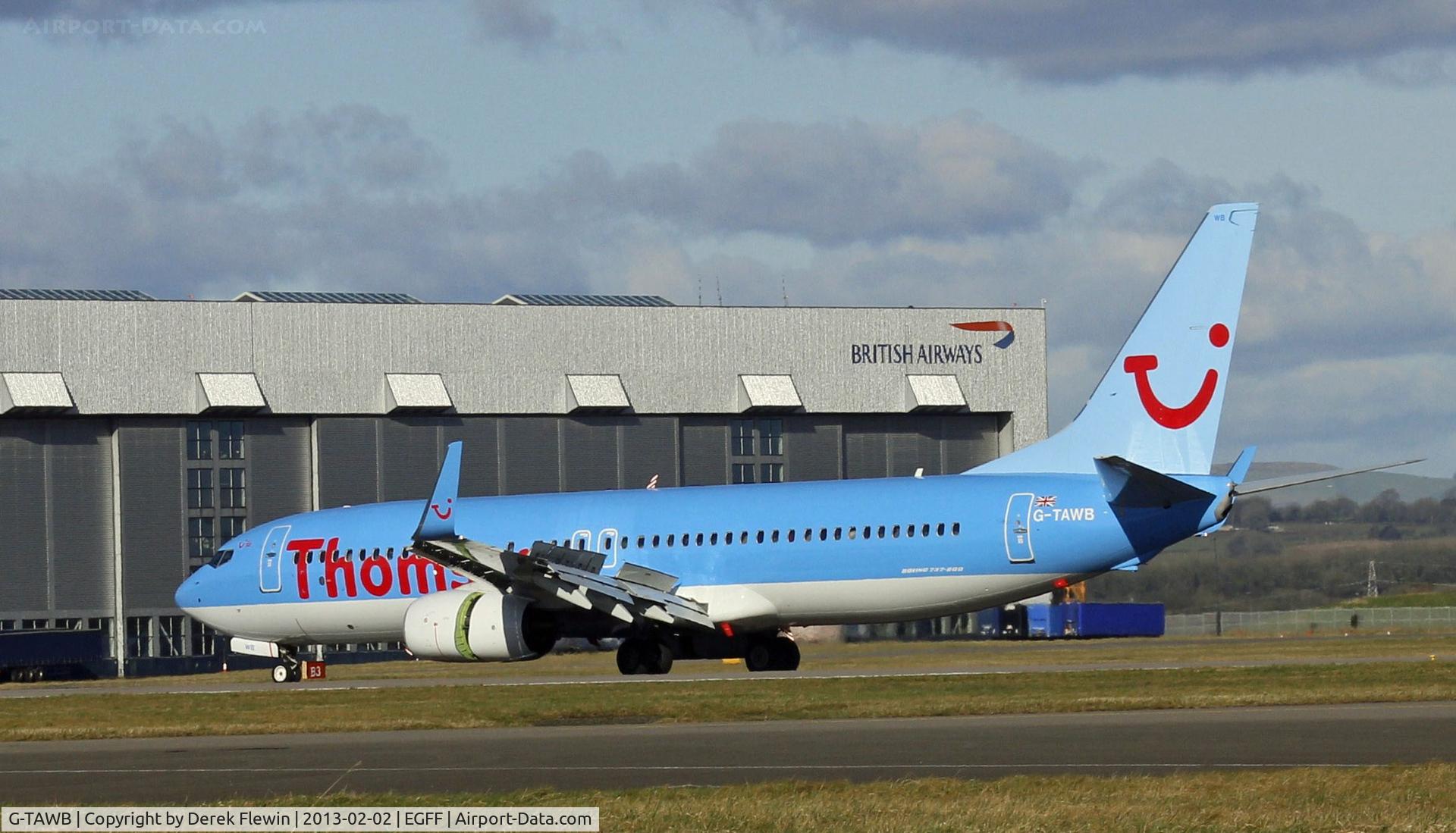 G-TAWB, 2012 Boeing 737-8K5 C/N 37242, Just after landing, showing open reverse thruster doors.