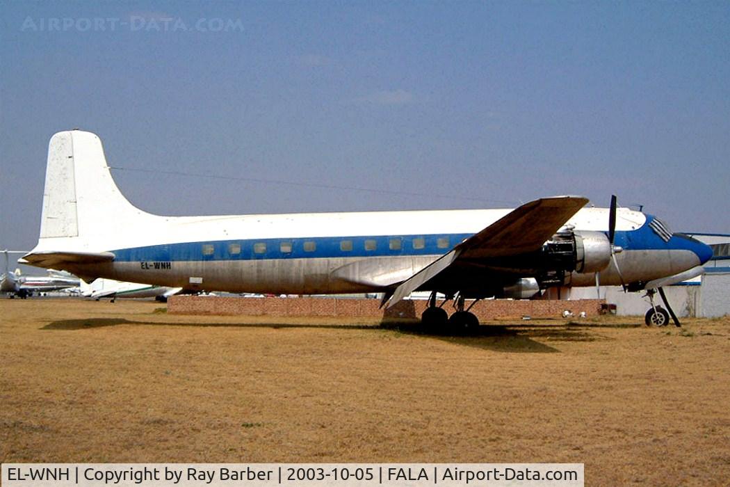 EL-WNH, 1948 Douglas DC-6 C/N 43127, Douglas DC-6B [43127] (Fire Service) Lanseria~ZS 05/10/2003. This was moved to the fire training area repainted and minus undercarriage.