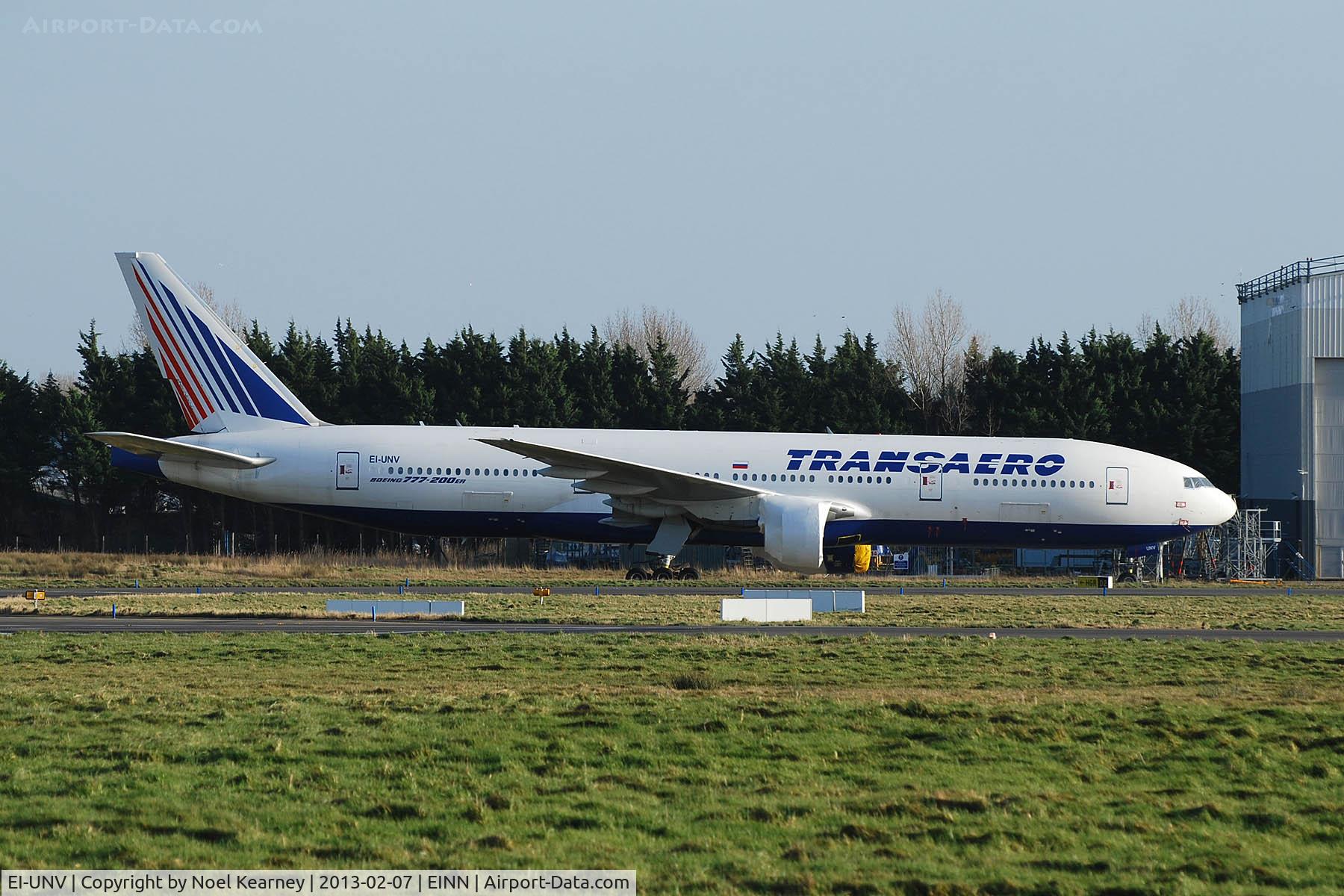 EI-UNV, 1999 Boeing 777-222/ER C/N 28714, Stored outside Transaero hanger.