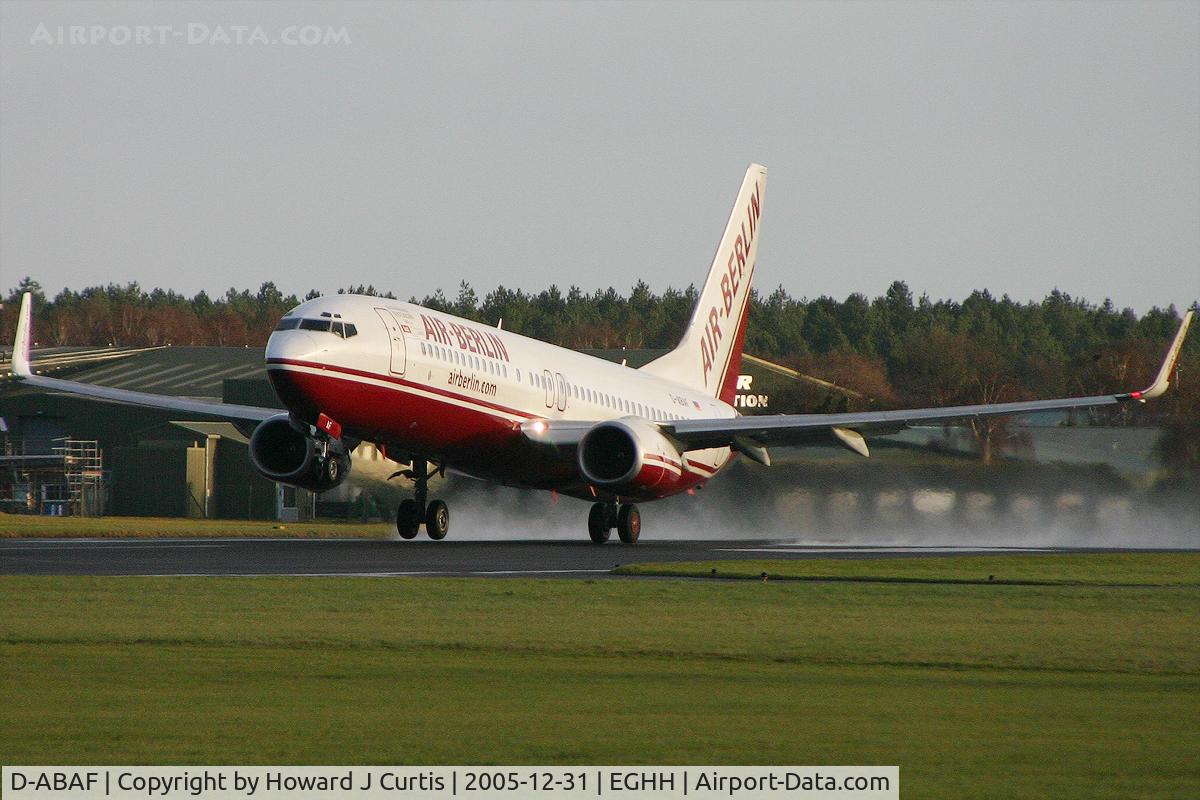 D-ABAF, 2001 Boeing 737-86J C/N 30878, Climbing out of Bournemouth on a damp December morning. [Canon EOS 300D].