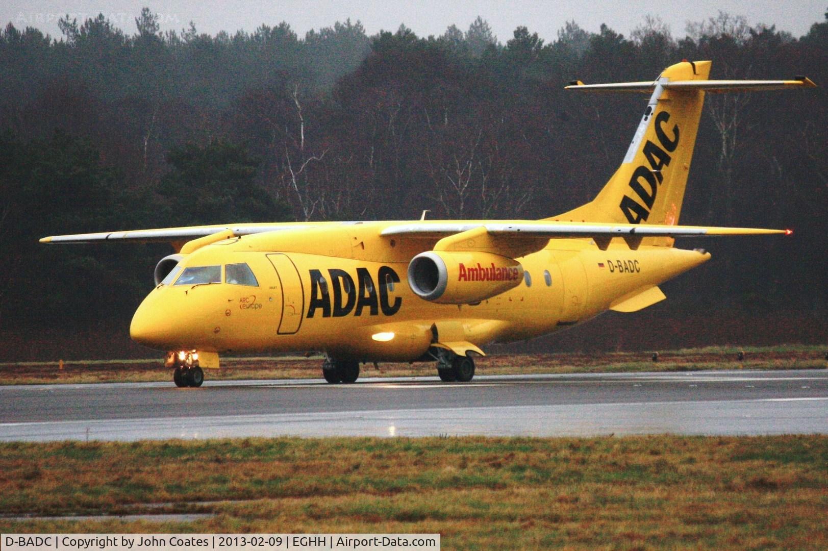 D-BADC, 2003 Dornier Do328JET C/N 3216, Departing in thick drizzle after a short stay