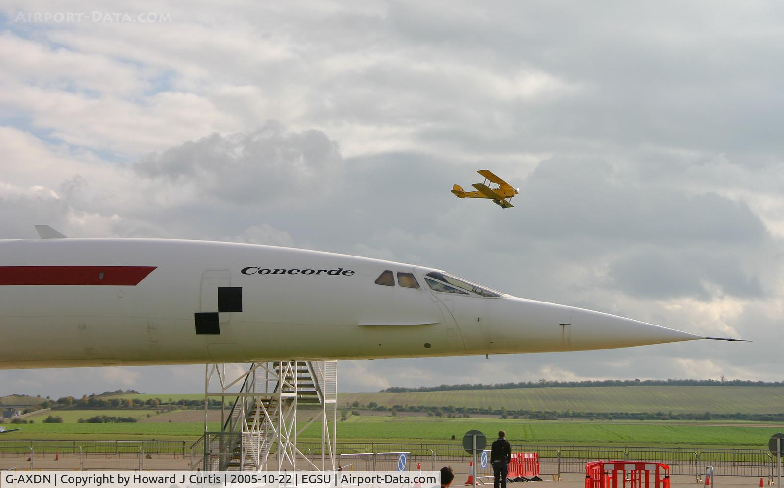 G-AXDN, 1968 Aerospatiale-BAC Concorde Prototype C/N 01/13522, Contrasting the new (sadly grounded) Concorde with the old (still flying) Tiger Moth behind.