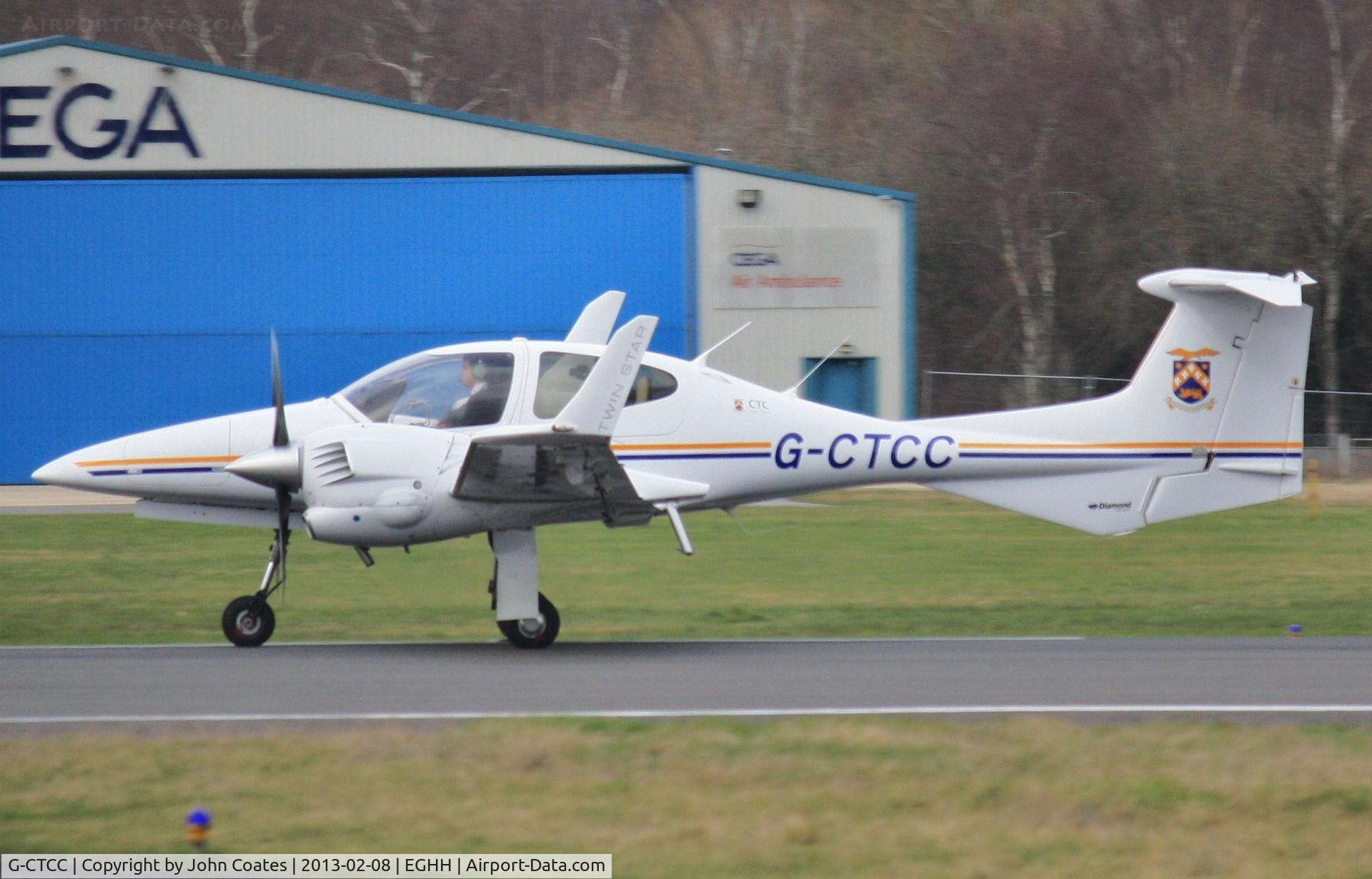 G-CTCC, 2006 Diamond DA-42 Twin Star C/N 42.161, ex G-OCCZ departs in the rain