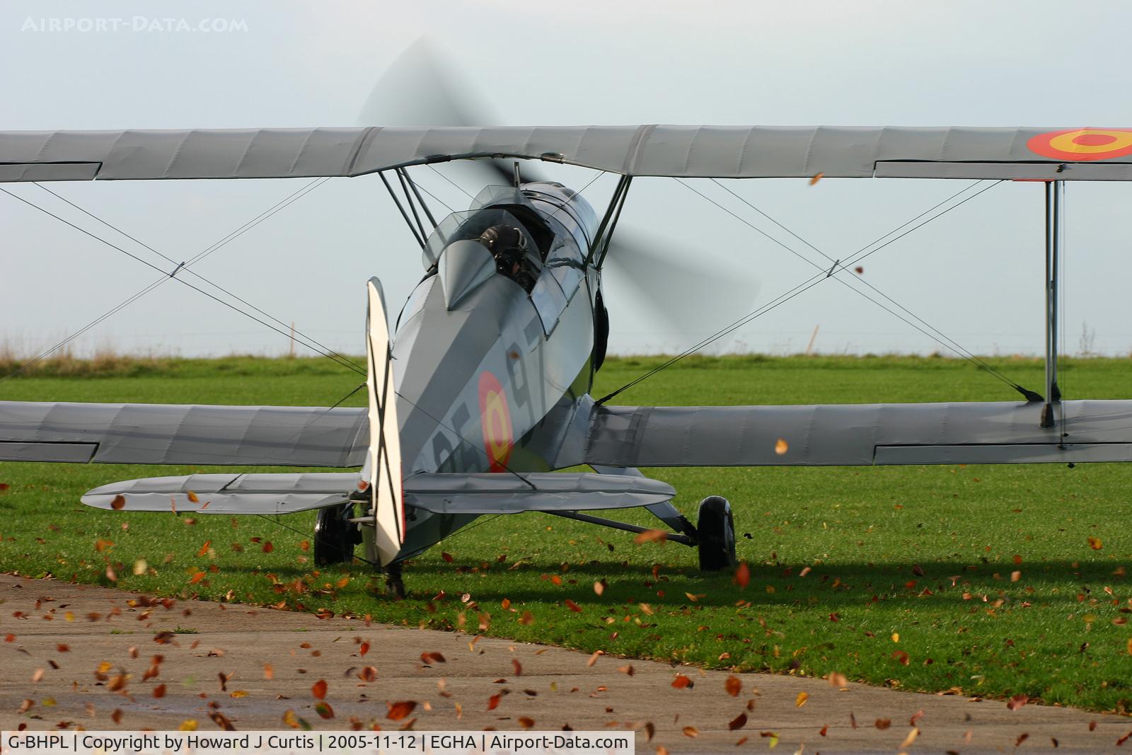 G-BHPL, 1951 CASA 1-131E Jungmann C/N 1058, Privately owned. Kicking up the leaves as it turns.